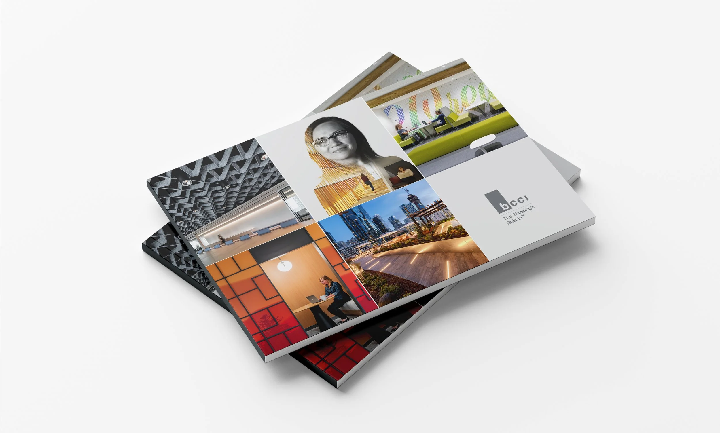 Brochure or magazine featuring images of modern architecture, cityscapes, and people working in professional settings.