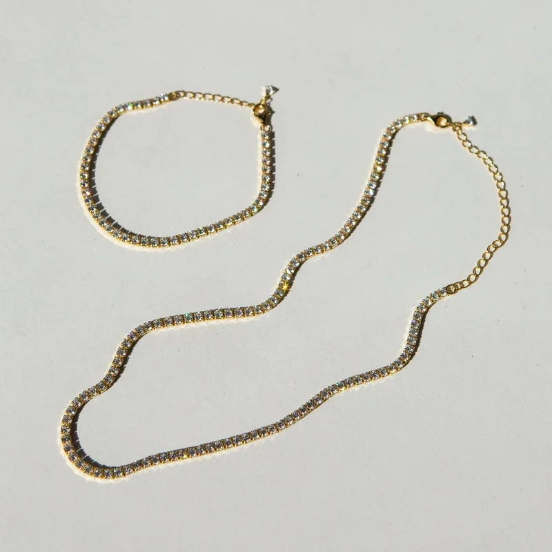 ASPEN_TENNIS_NECKLACE_BRACELET_SET_GOLD2_7381d5a8-fcdb-4045-a05b-b13bc9bcde6a.webp