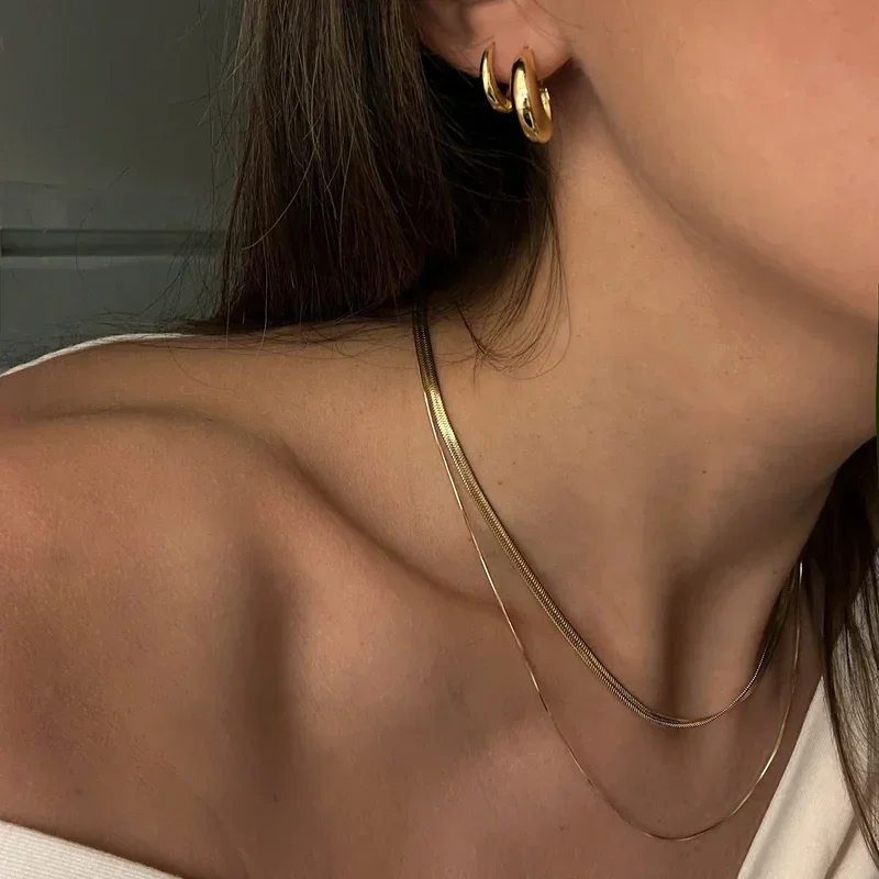 GretaSamPositanoMiniPositanoHoopsBerlinSphinxNecklace_25f3c504-025a-4a10-ab46-b1282663ad21.webp
