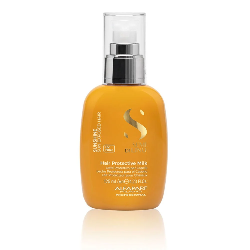 A bottle of semi di lino Hair Protective Milk with a spray nozzle, designed for sun-exposed hair, featuring orange packaging and silver spray cap.