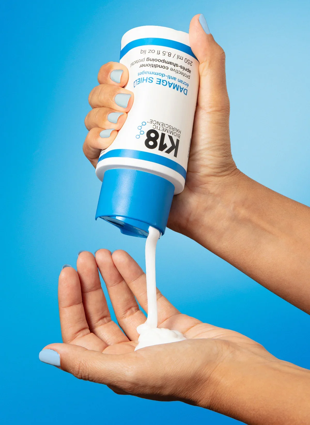 DamageShields_conditioner_8.5oz_InHand.webp