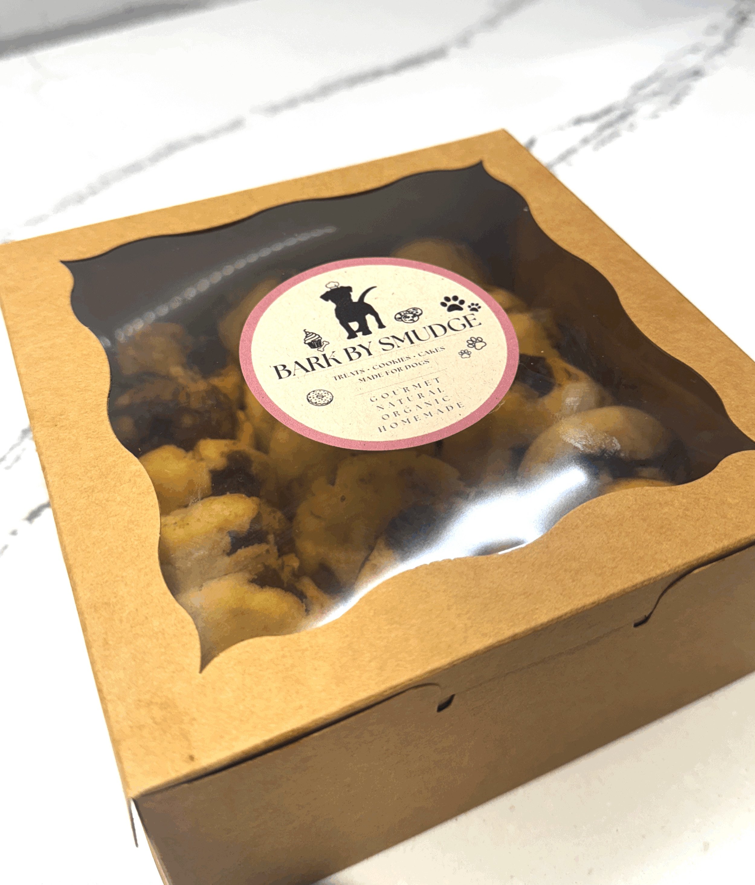 Homemade carob chip dog cookies made with organic almond flour, coconut flour, natural virgin coconut oil, and carob drops, offering a healthy and delicious treat for dogs. Ottawa