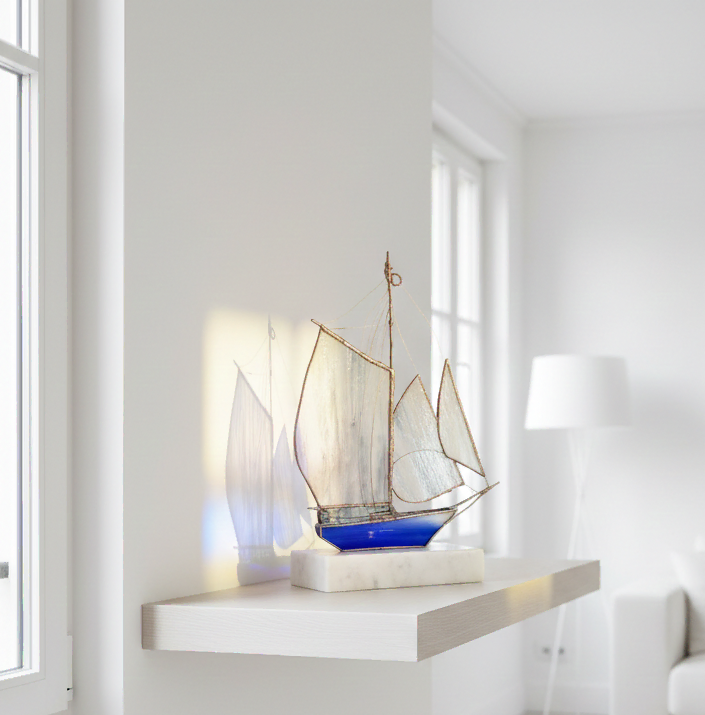 cobalt-blue-glass-yacht-sculpture.webp