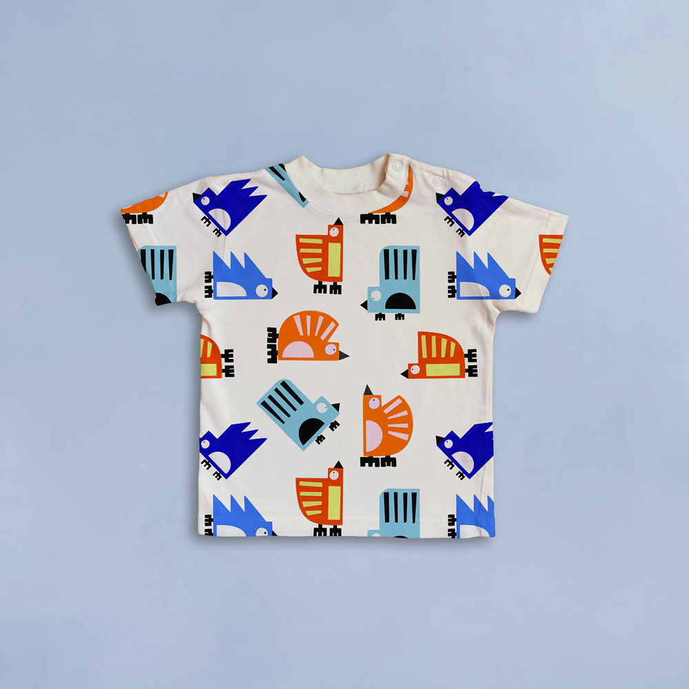 Bold and Colourful geometric bird design all over print on a t-shirt, also great for childrenswear and lifestyle products and