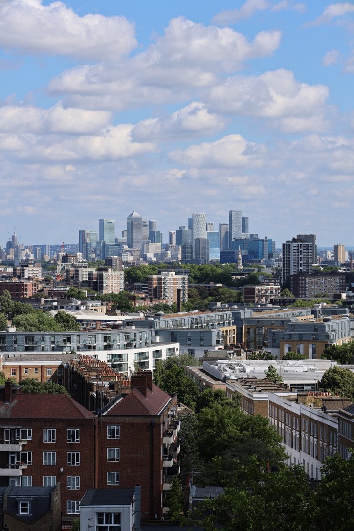 A picture of Canary Wharf from the top of St Mary's Church, Islington.
