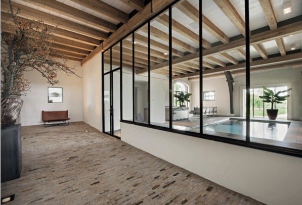 Steel doors and windows for swimming pool. Super homes. Mammoth Steel UK. Steel doors UK