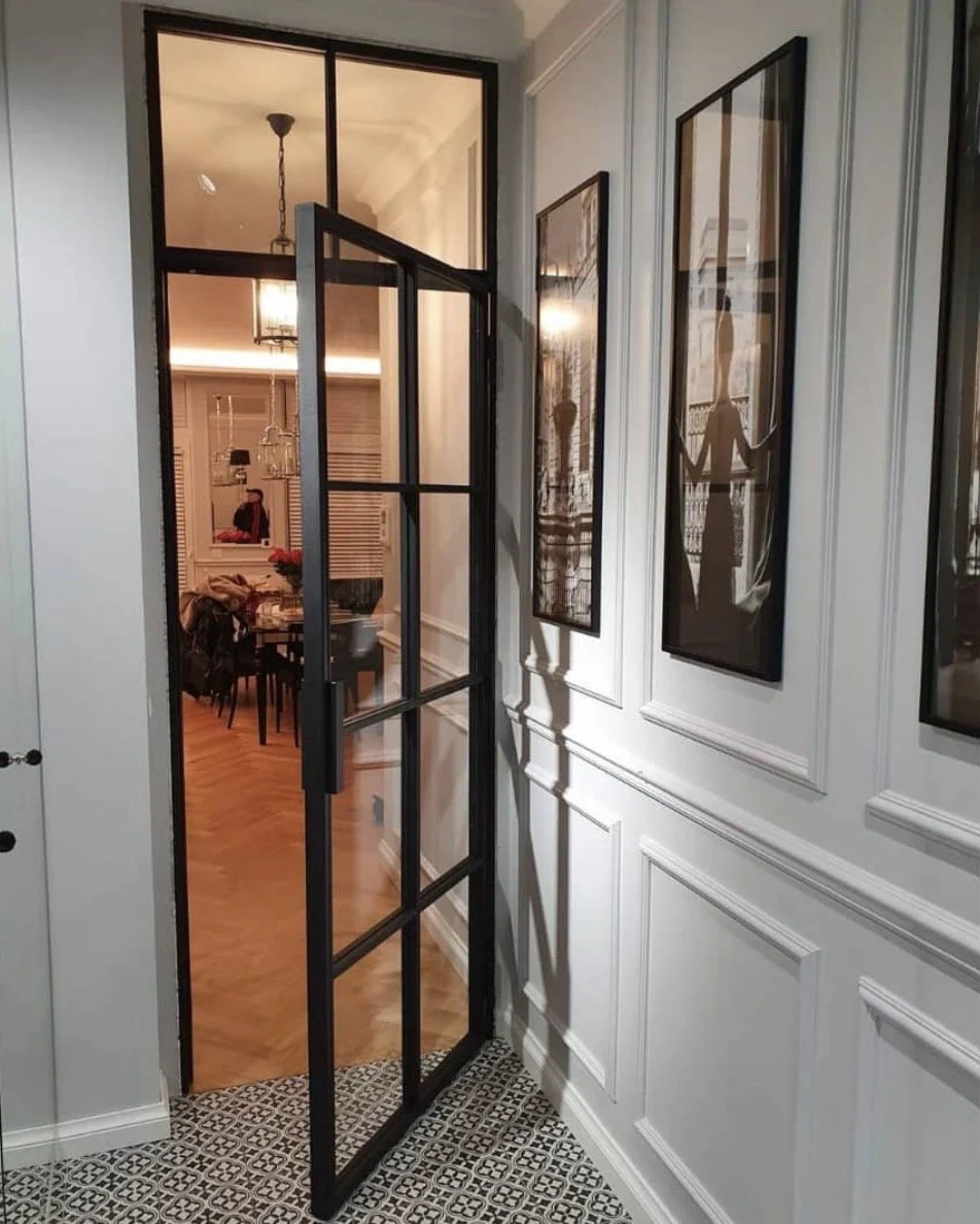 Internal steel door. Glass panelled steel door.
