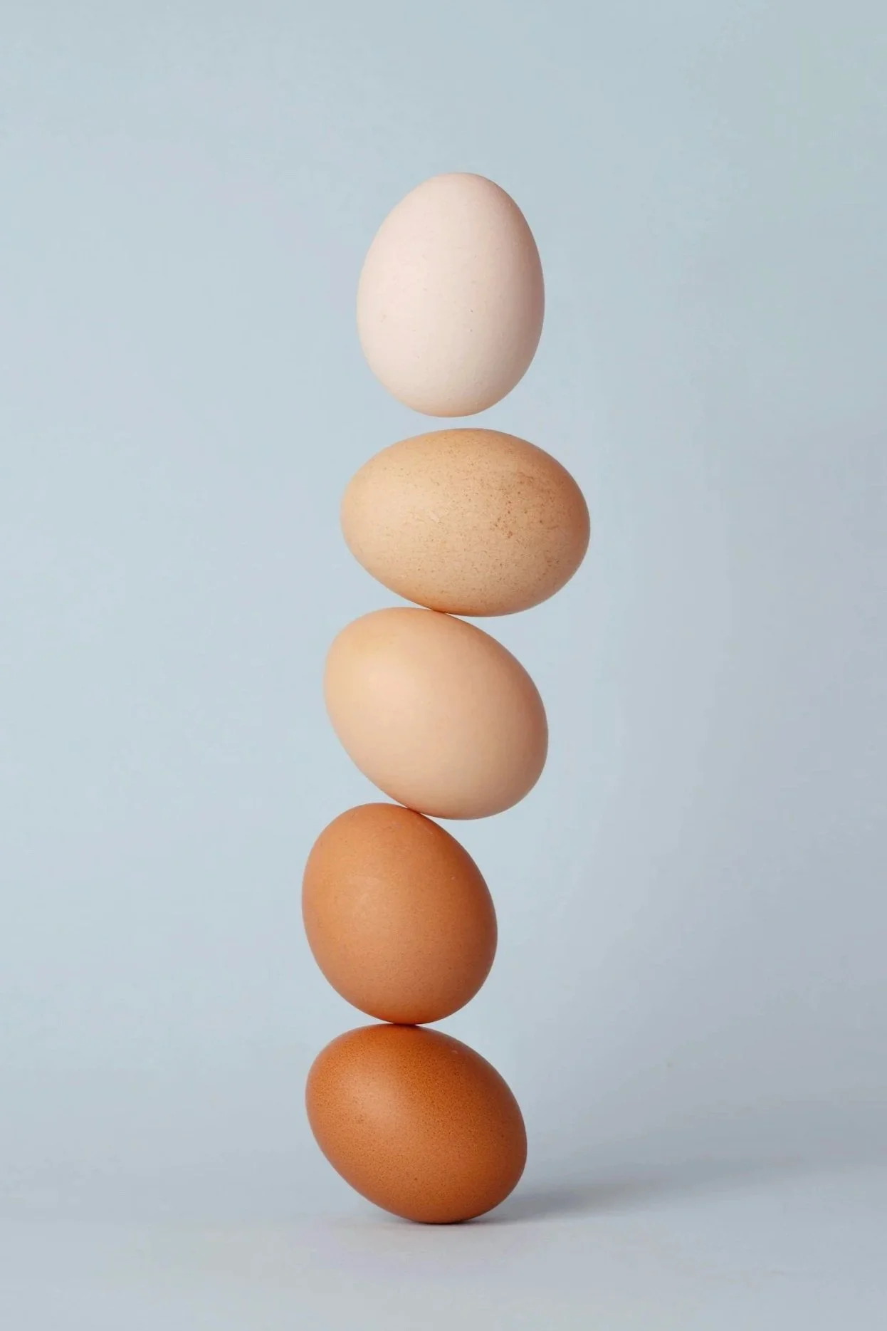 A stack of eggs, a good source of choline for prenatal nutrition.