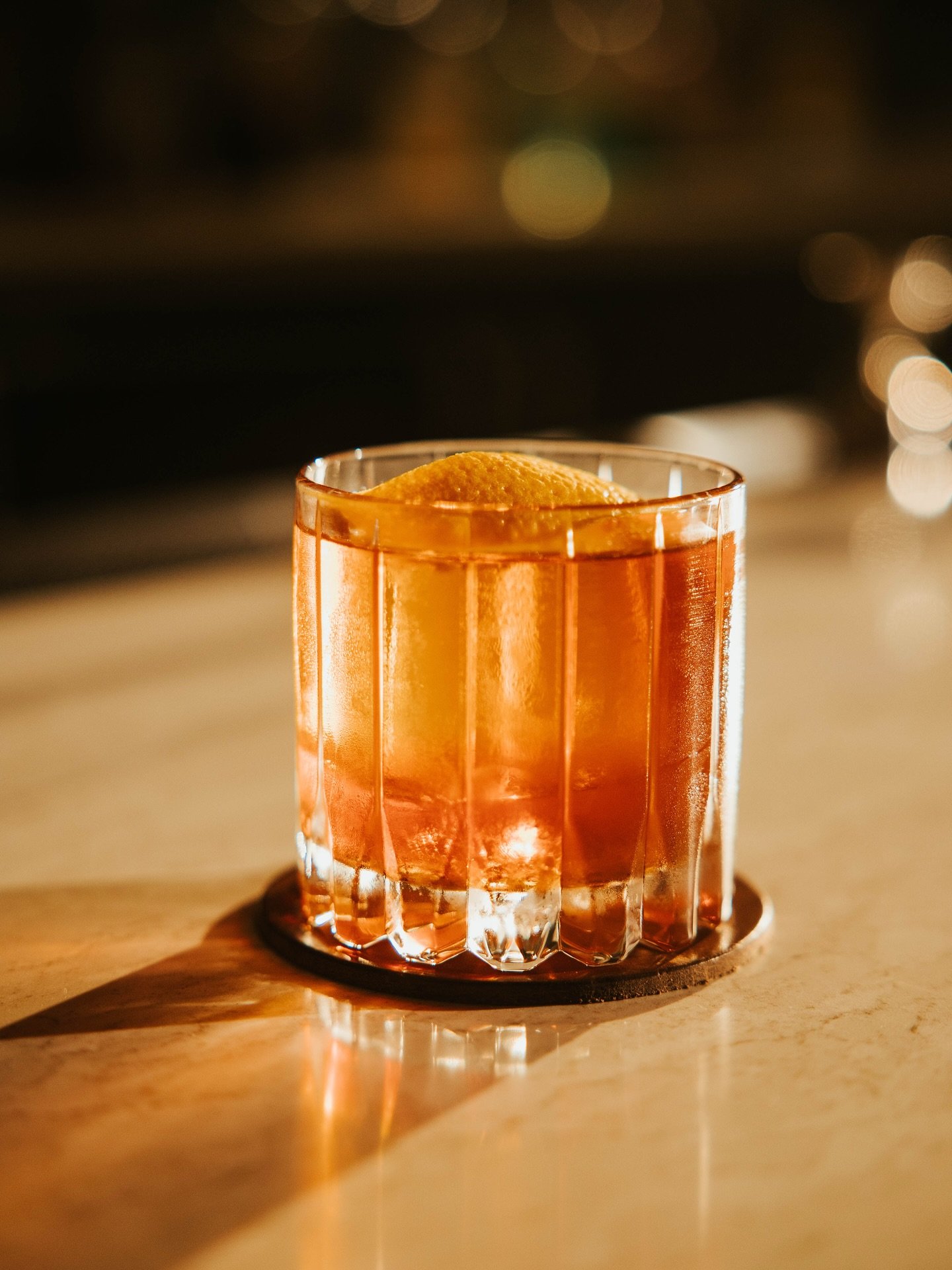 Our Old Fashioned is a house staple. Familiar in many ways, with a little je ne sais quoi, ours is crafted with Wheat Whiskey, Rye Whiskey, Jamaican Rum, Cognac, Maraschino liqueur, and Angostura Bitters. 

You can enjoy this, and other menu classics