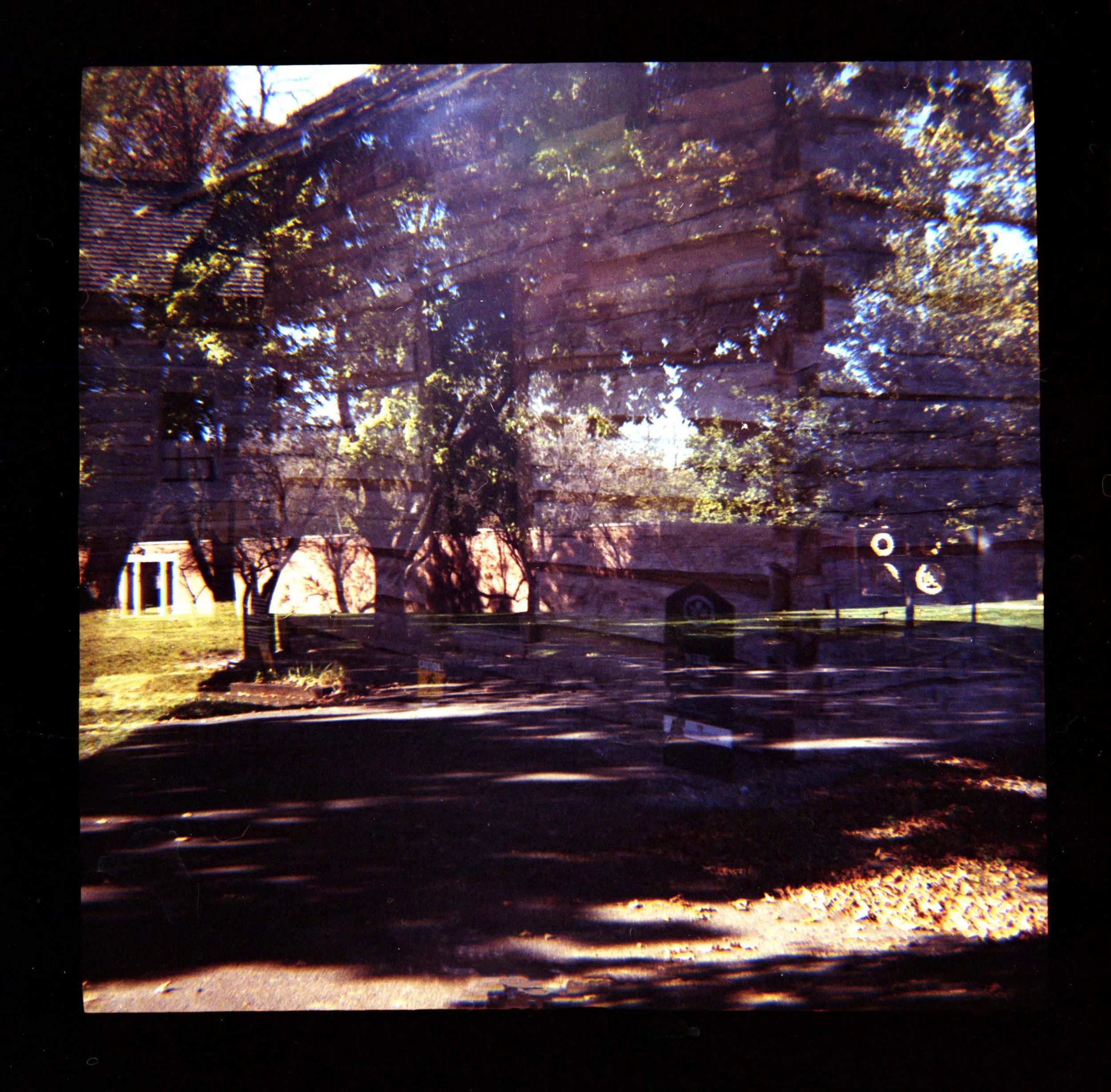 Toepp_H_The Roofless Church Gates and Log Cabin_2024.jpg