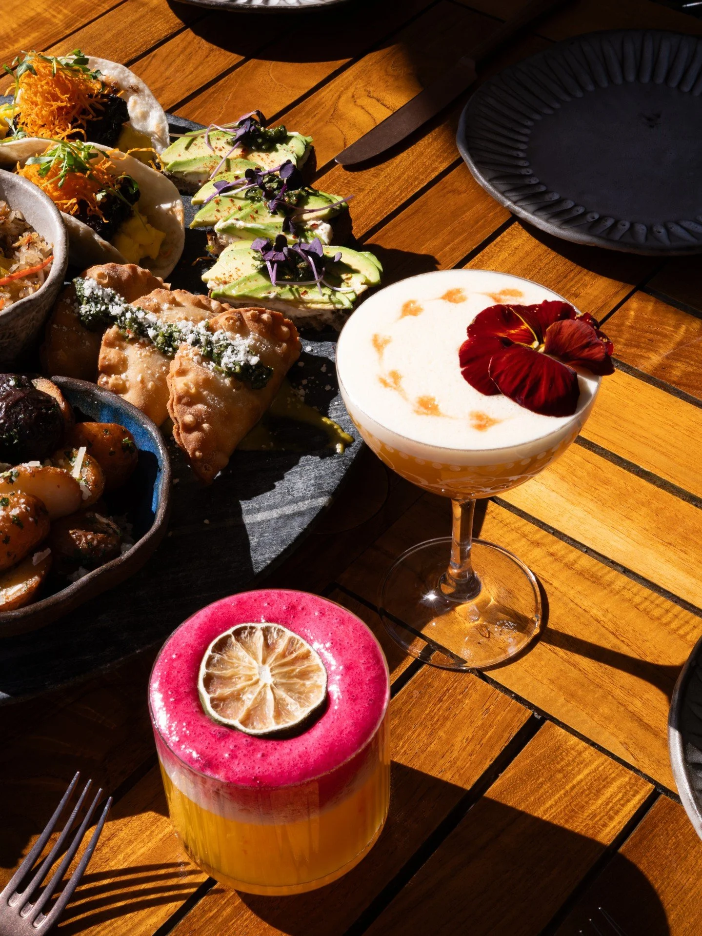 Brunch served with hibiscus rosemary foam. Experience a full array of flavors from sweet to savory, bright to botanical, each sip crafted to surprise and delight.