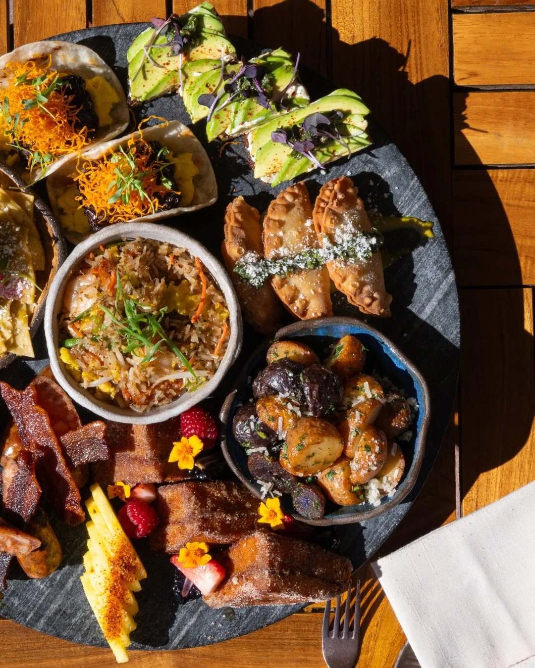 Sweet. Savory. Spicy. Repeat.
Our brunch board has become a local favorite for a reason, featuring an irresistible assortment of brunch classics perfect for sharing, sampling, and savoring.