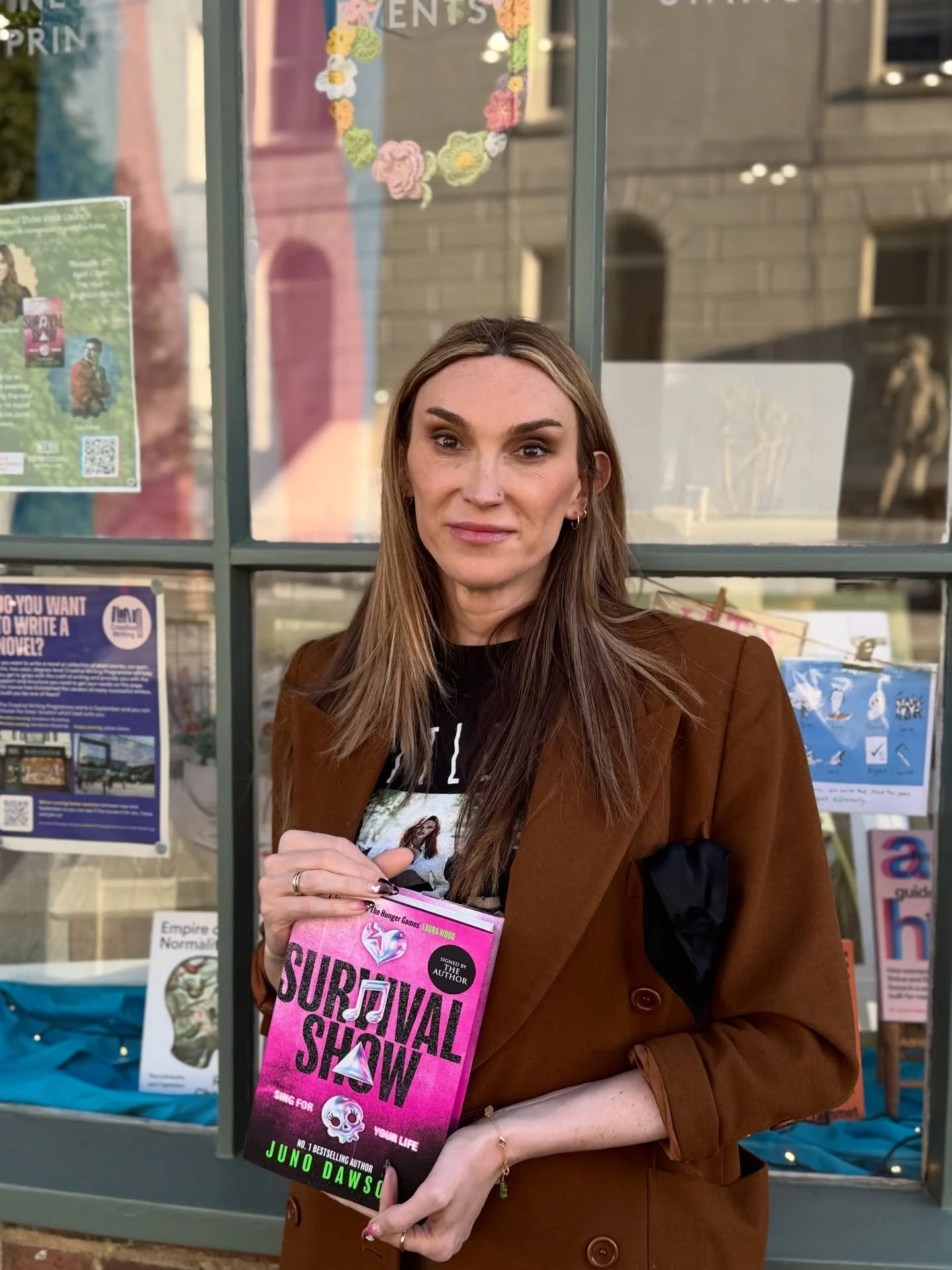We&rsquo;re obsessed! 📚🌟

Huge love to the incredible Juno Dawson holding her brand new YA novel, Survival Show 💖🏳️&zwj;⚧️

Featuring a trans character, this thrilling read takes you on a rollercoaster ride of girl band drama in an X Factor meets