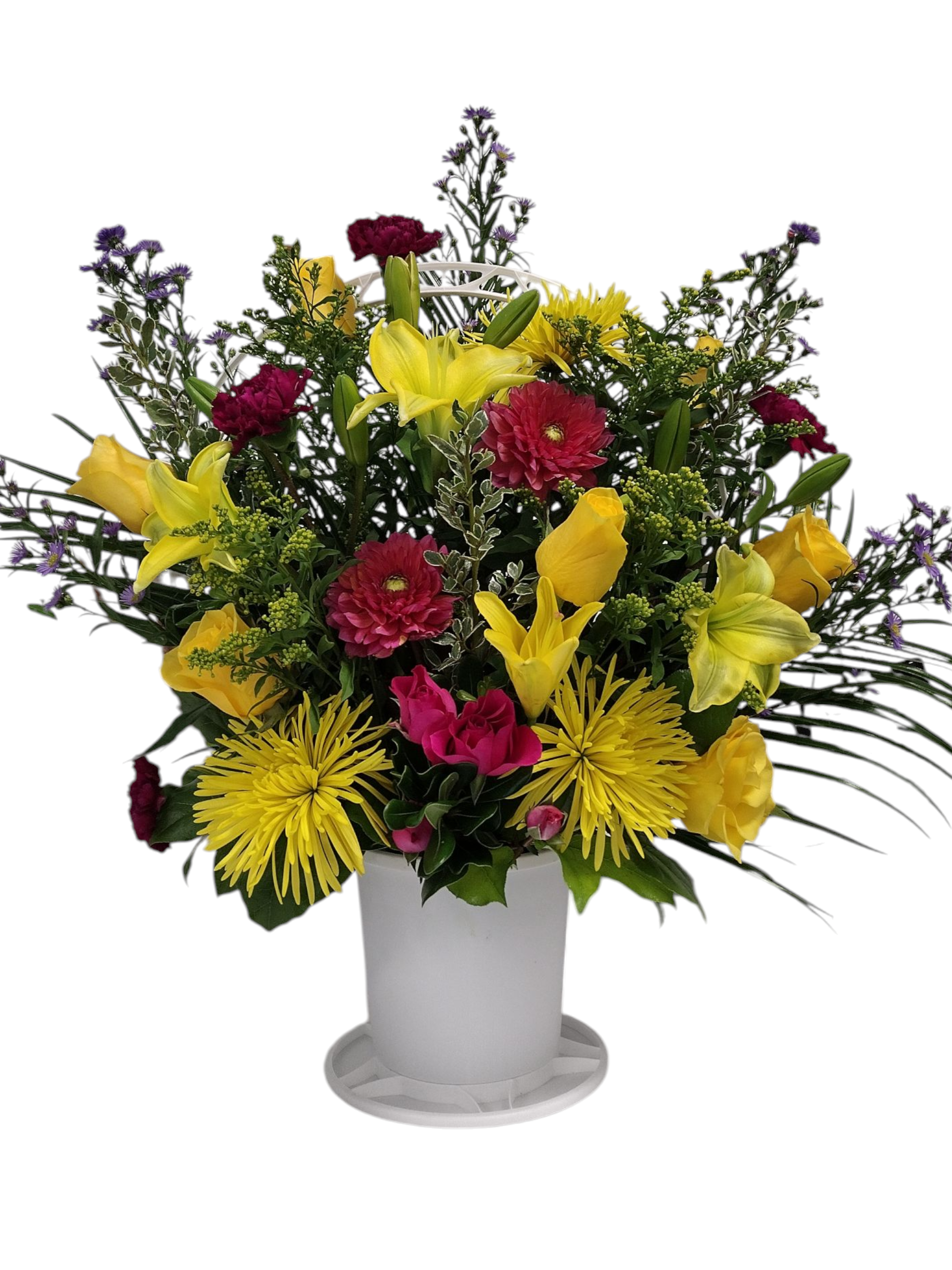 Colorful flower bouquet in white vase with yellow, pink, and purple flowers and greenery.