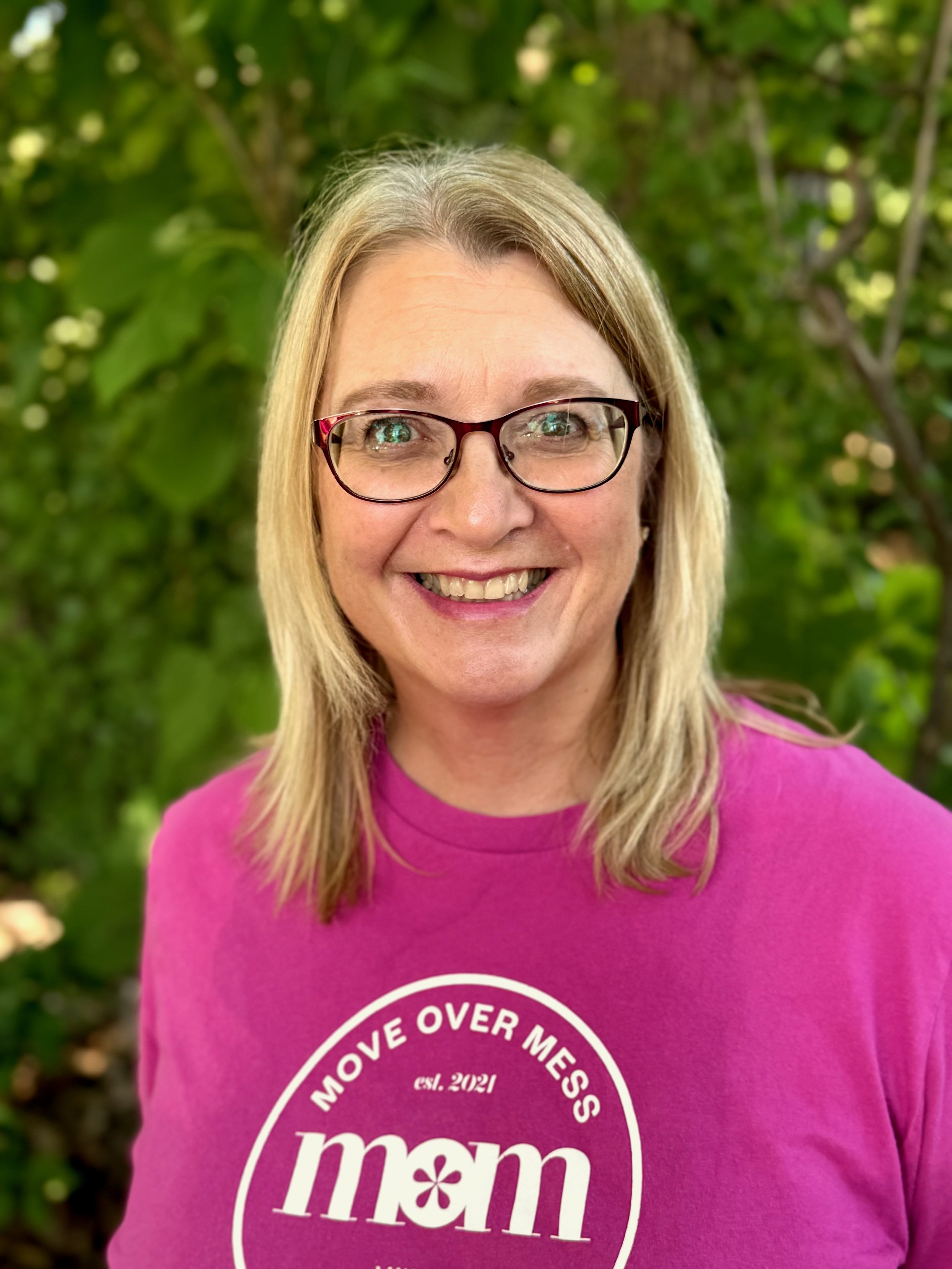 Home organizer Colleen standing outside and smiling