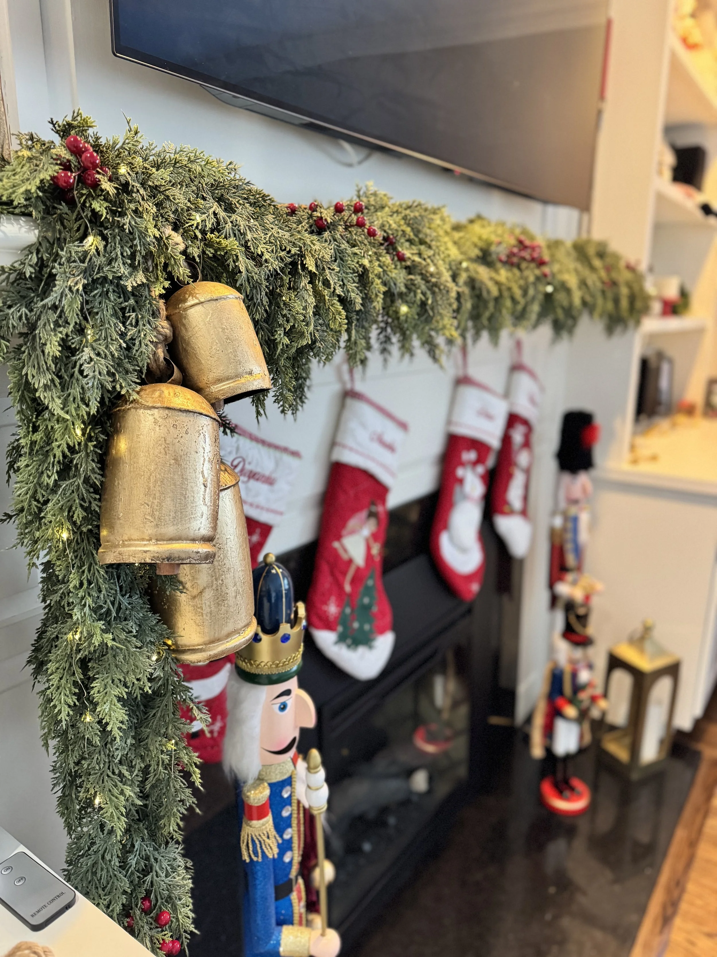 Mantel garland with cranberries and bells