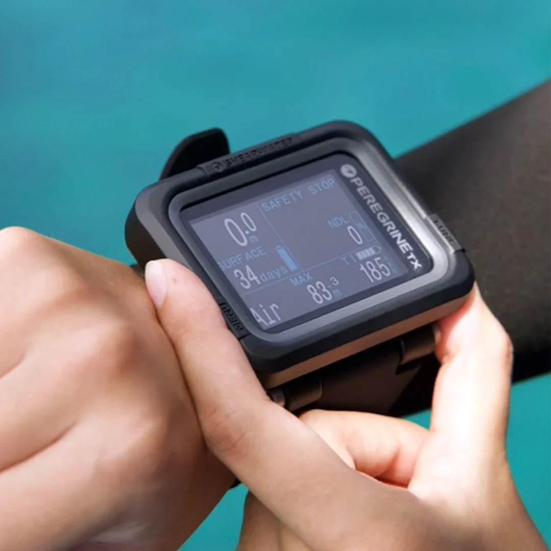 PeregrineTX_Product_Closeup_on_wrist_pressing_buttons_dab07d10-ec5f-46c5-9d05-38e9d94ff412.webp