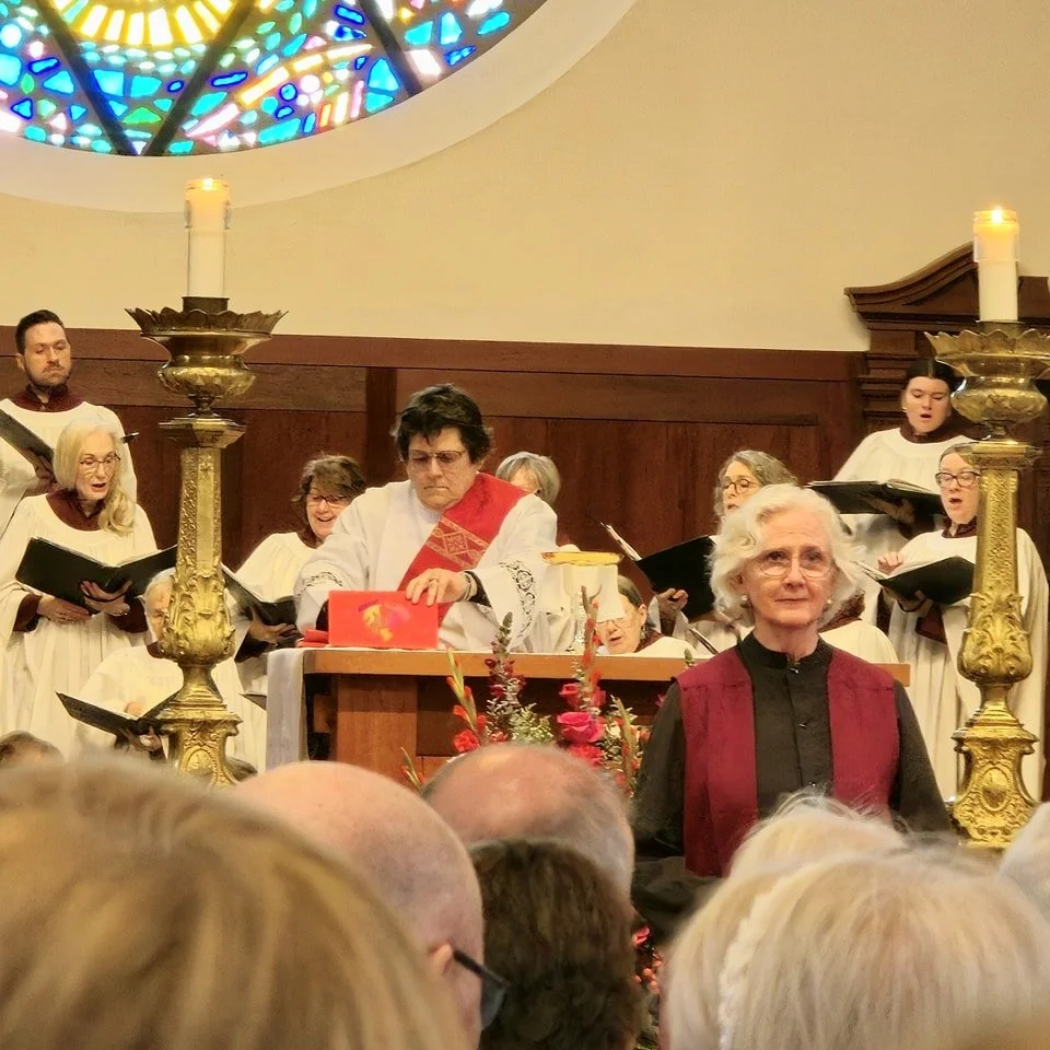 Our newly ordained Deacon, Mary Kathryn Brooks, setting the table for Communion at Trinity Cathedral.