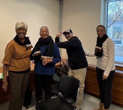 Toni Cox Burns, Francine Shorts and Gloria Welcome being mic'd up by tech, Michael for videotaping at WCC for gala event