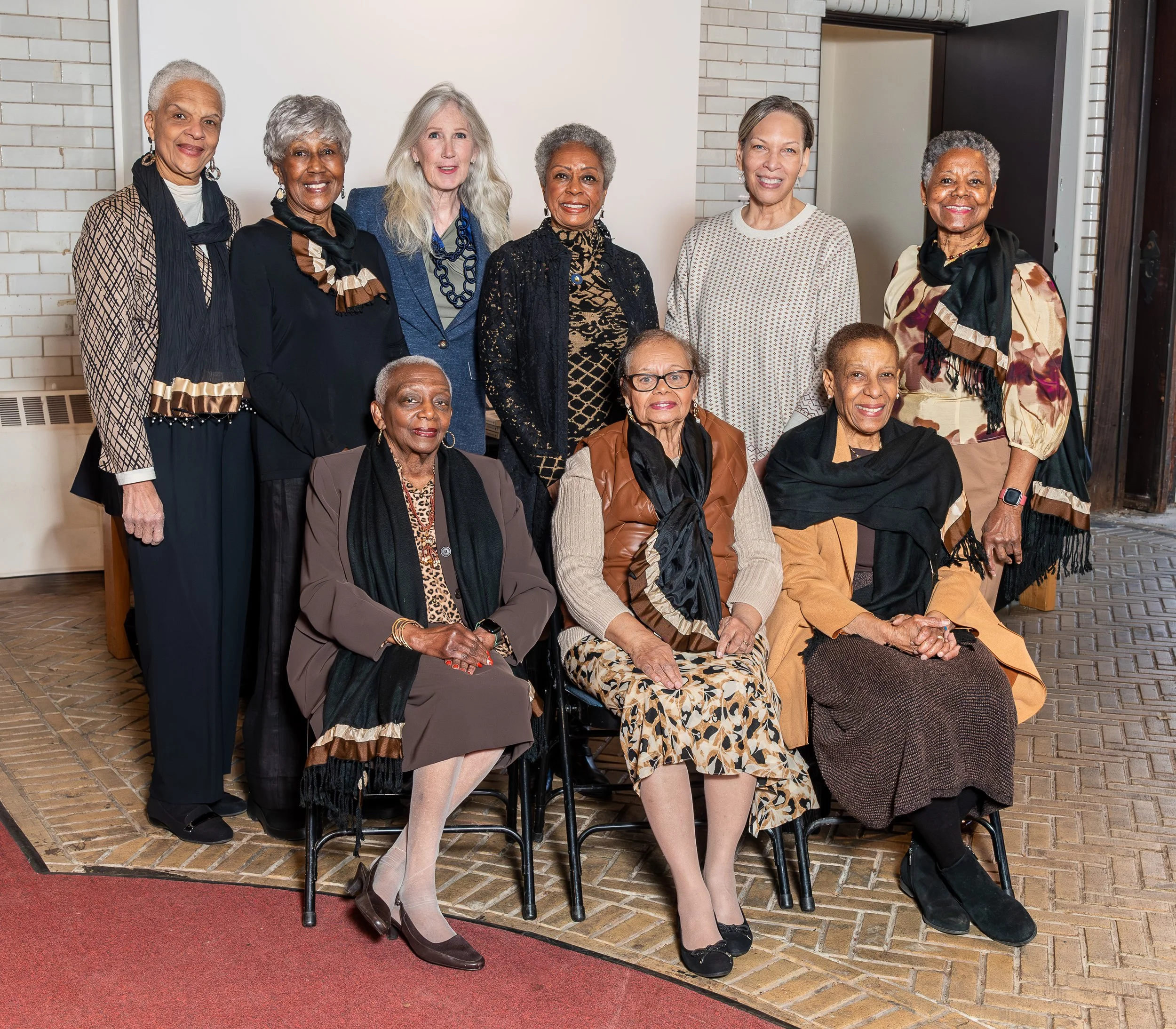 2025 Literary Celebration Committee, Standing:  Gwen Cort, Toni Cox-Burns, JHC President Suzanne Clary, Authors:  Sarah Bracey White and Julie Seely, Francine Shorts, Seated:  Janette Wilson, Kitty Gordon, Gloria Welcome