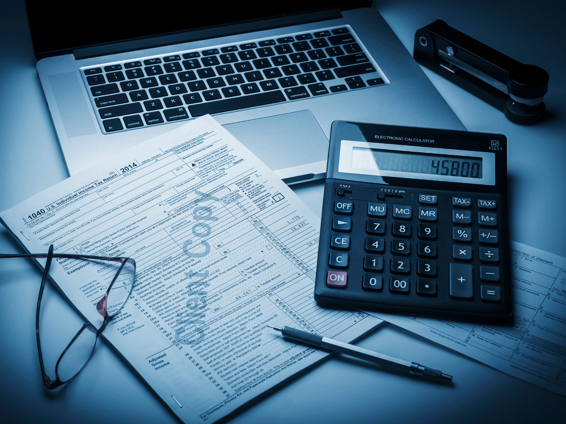 Foreclosure surplus funds claim process with tax forms and financial paperwork, Kingdom Assets Group helping homeowners recover $45,800 in excess proceeds