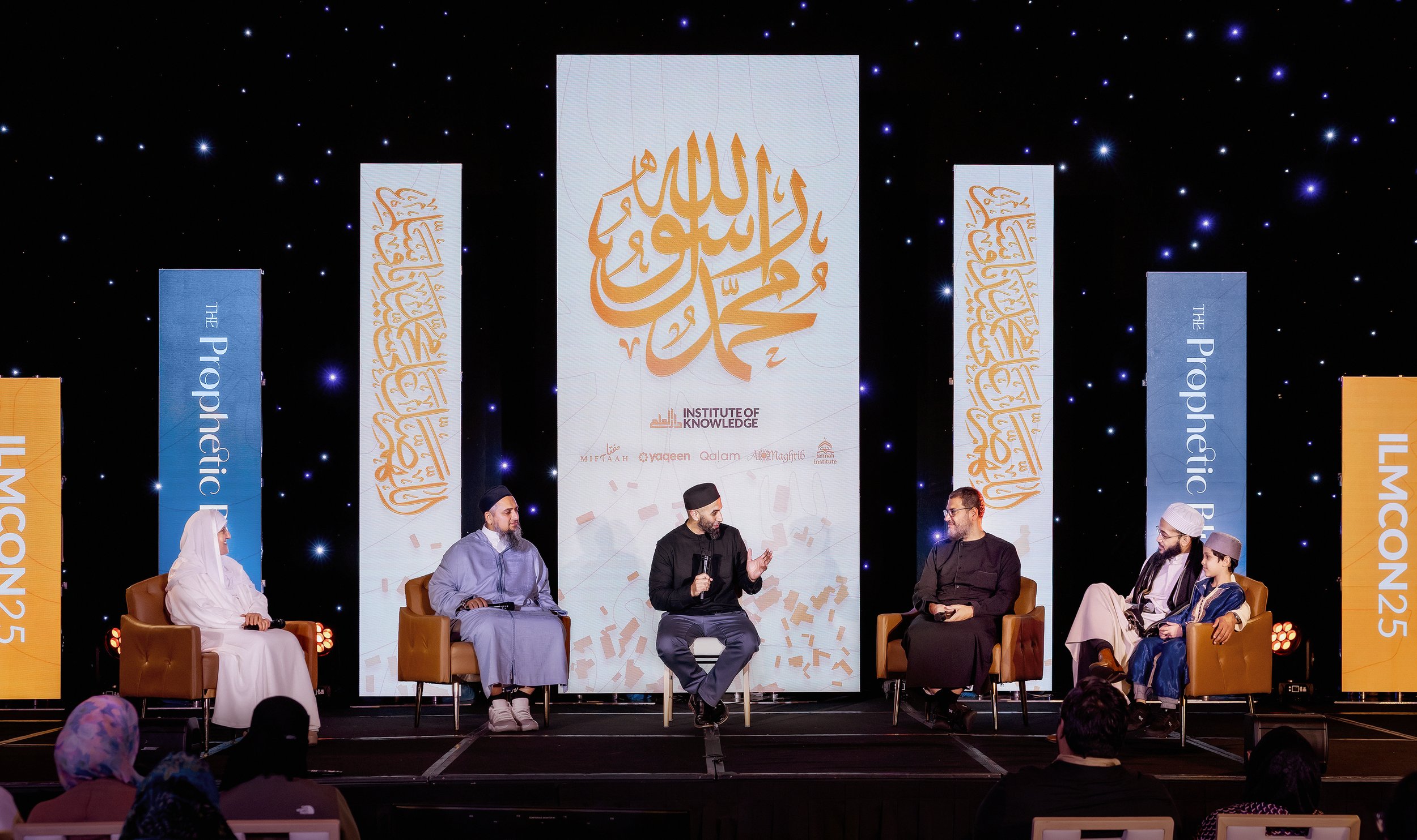 Panel discussion at ILMCON25 by the Institute of Knowledge on a custom LED stage backdrop with professional lighting and IMAG production by Samson Productions