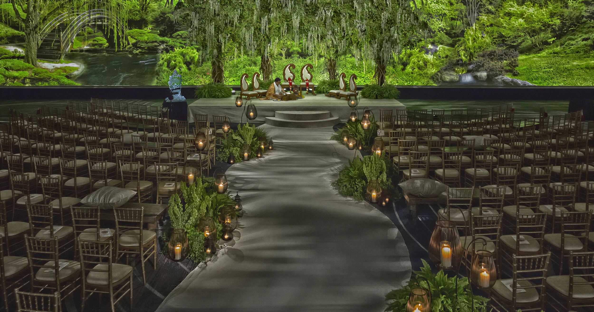 Japanese garden inspired wedding ceremony created with a 150-foot wide rear projection screen and immersive digital scenery by Samson Productions