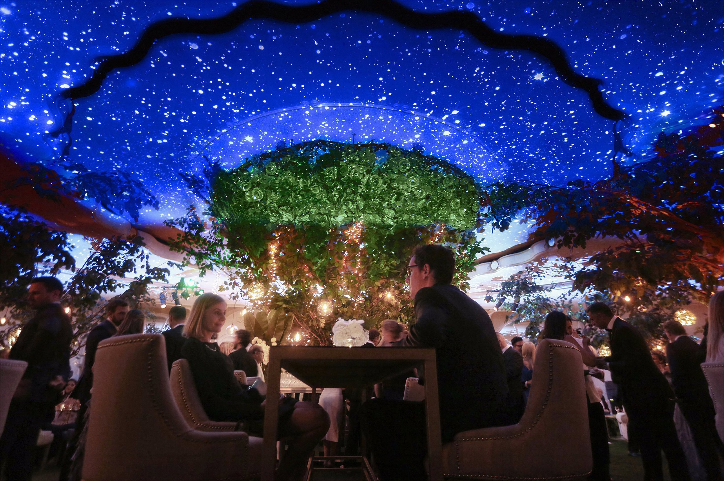 Immersive ceiling projection mapping with star-constellation visuals at the Beverly Hills Hotel, produced by Samson Enterprise Solutions.