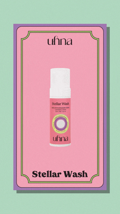Caja rosa con producto en un envase dispensador y texto en inglés y español que dice 'Stellar Wash' y 'Limpieza estelar'