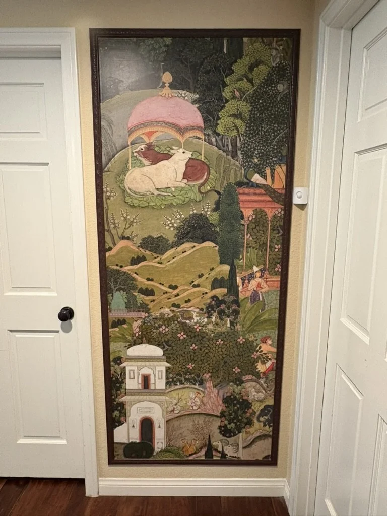 South Asian Formal Entry refresh with Ruggable Kavi Rug, Arhaus benches and Finley cabinet. Design by Haveli Designs in Colorado. Features Mind The Gap wallpaper as murals and embossed trim