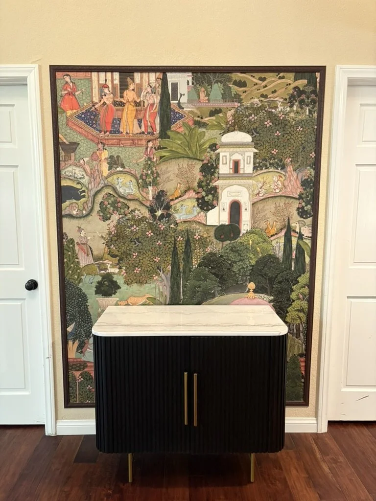 South Asian Formal Entry refresh with Ruggable Kavi Rug, Arhaus benches and Finley cabinet. Design by Haveli Designs in Colorado. Features Mind The Gap wallpaper as murals and embossed trim