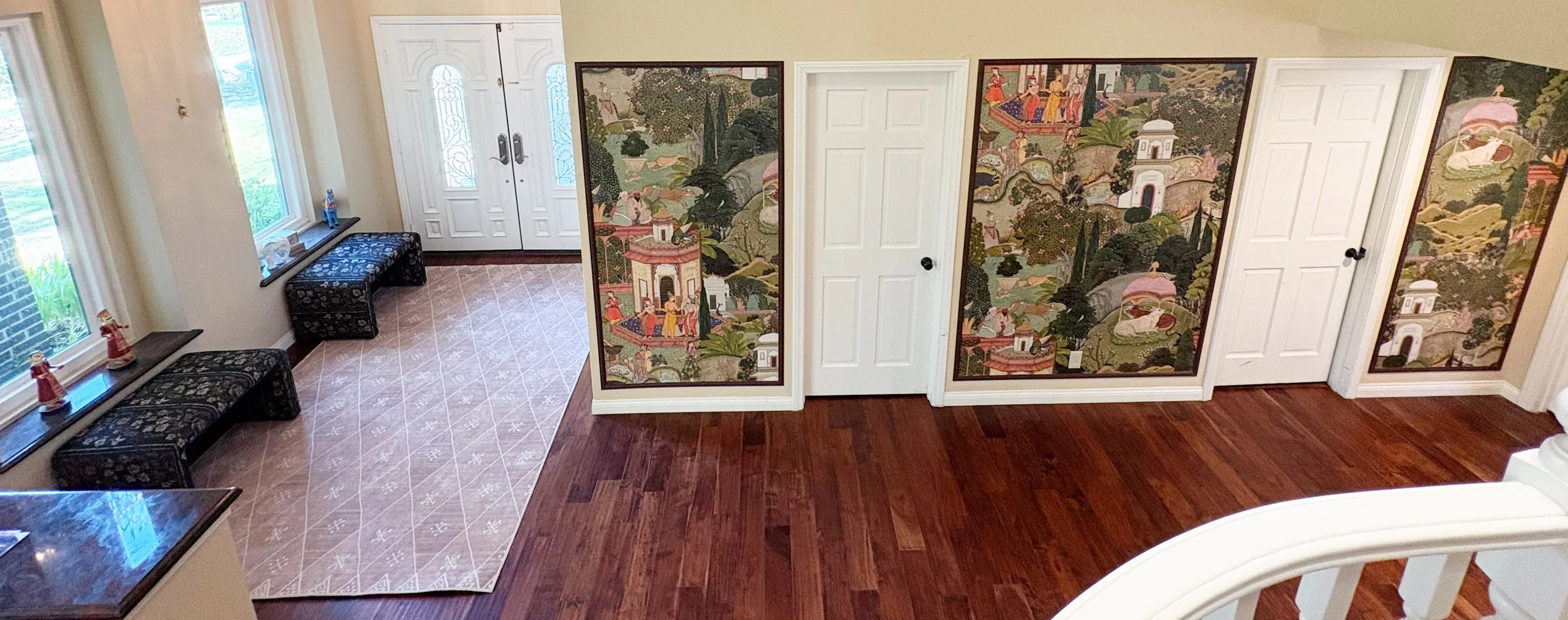 South Asian Formal Entry refresh with Ruggable Kavi Rug, Arhaus benches and Finley cabinet. Design by Haveli Designs in Colorado. Features Mind The Gap wallpaper as murals and embossed trim