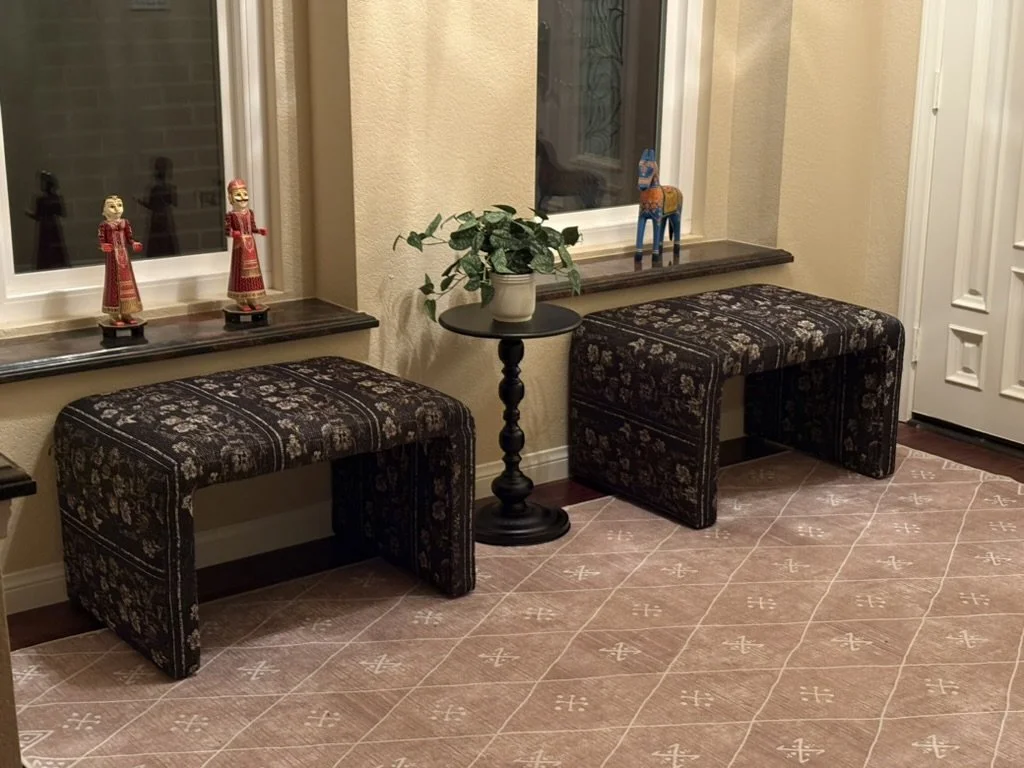 South Asian Formal Entry refresh with Ruggable Kavi Rug, Arhaus benches and Finley cabinet. Design by Haveli Designs in Colorado. Features Mind The Gap wallpaper as murals and embossed trim