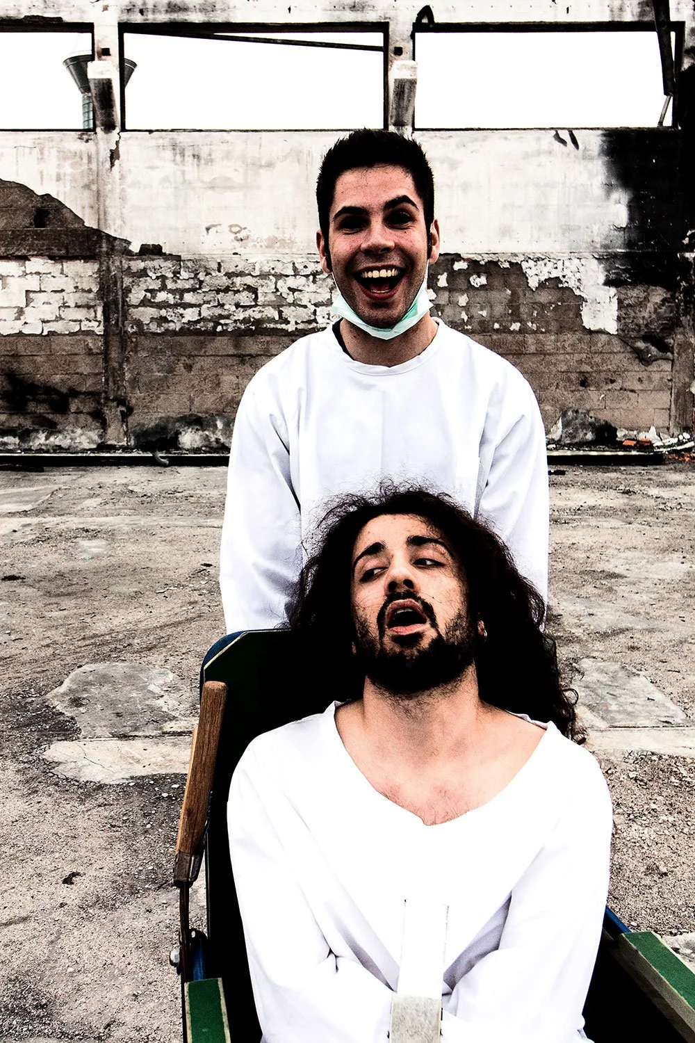 Narrative and funny press photography with a wheelchair in a burned factory for nu-metal portuguese band Lendfall