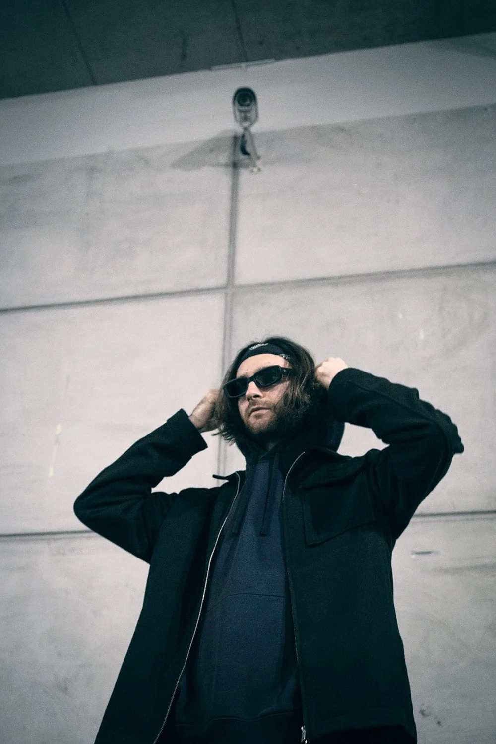 Press photography for drum'n'bass producer with brutalist scenario