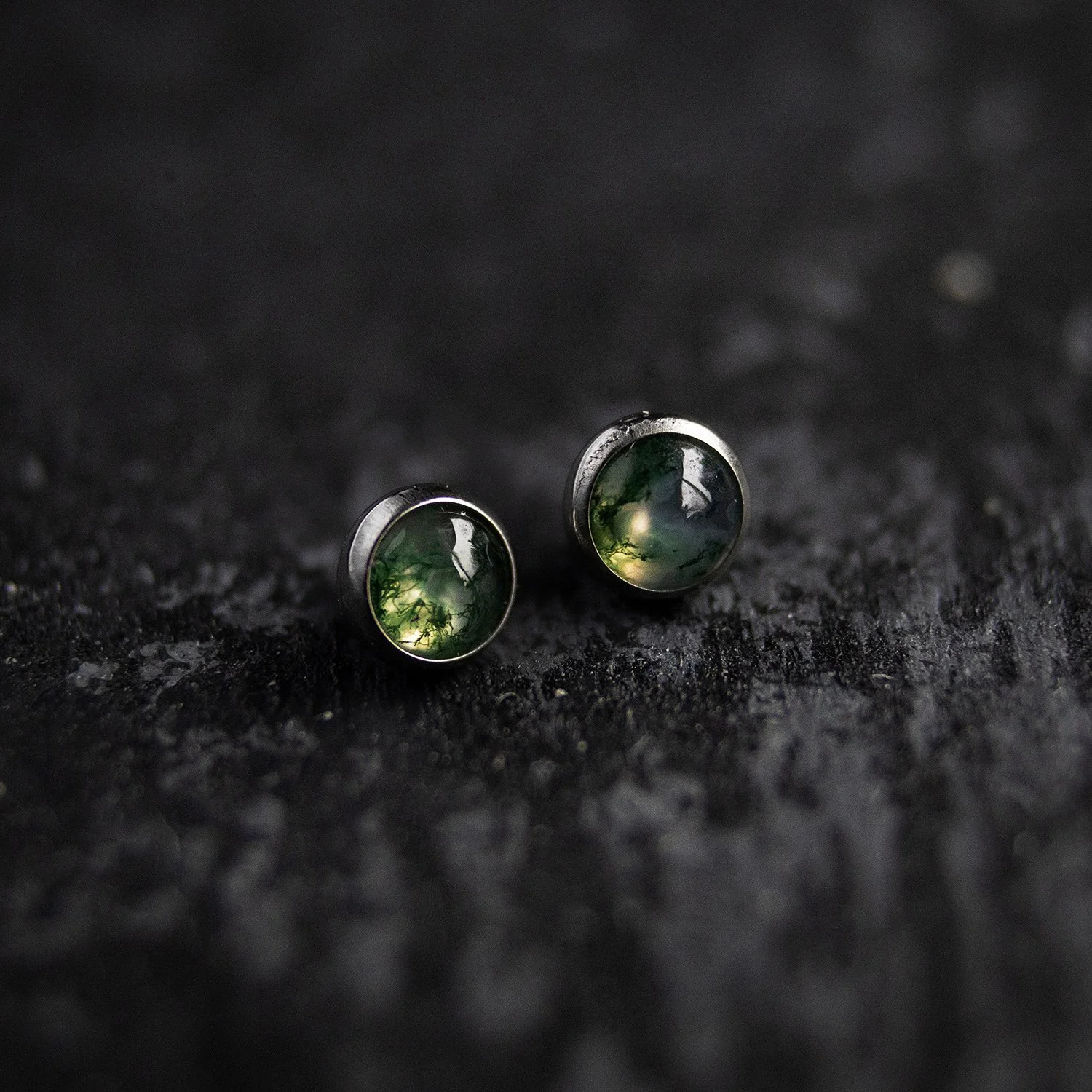 Moody product photography with piercing jewelry