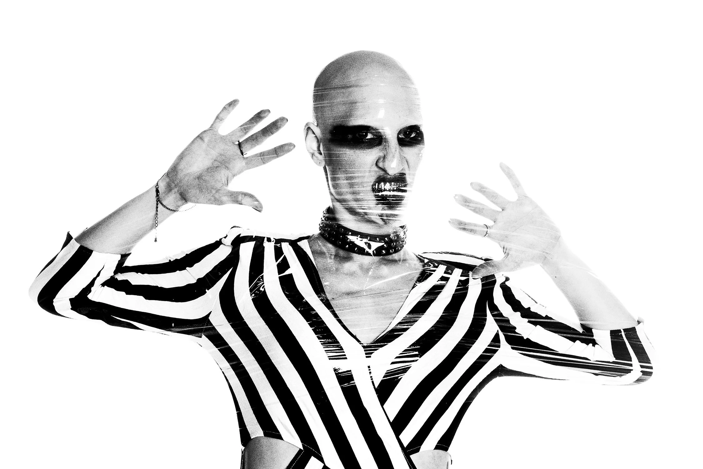 Black and white dark and fetishistic fashion editorial bold black make-up 