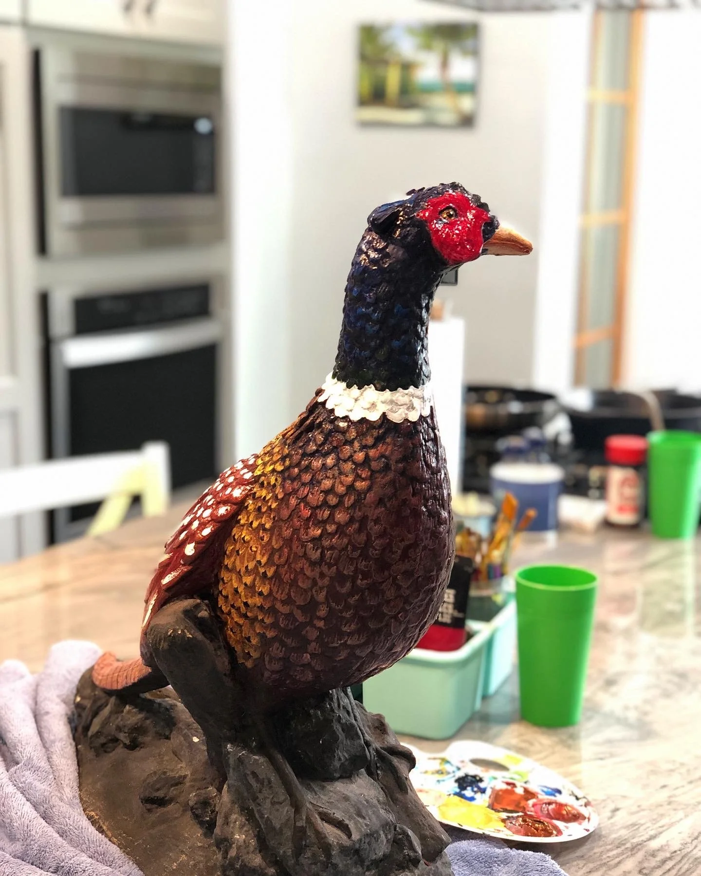 Pheasant lawn statue painting