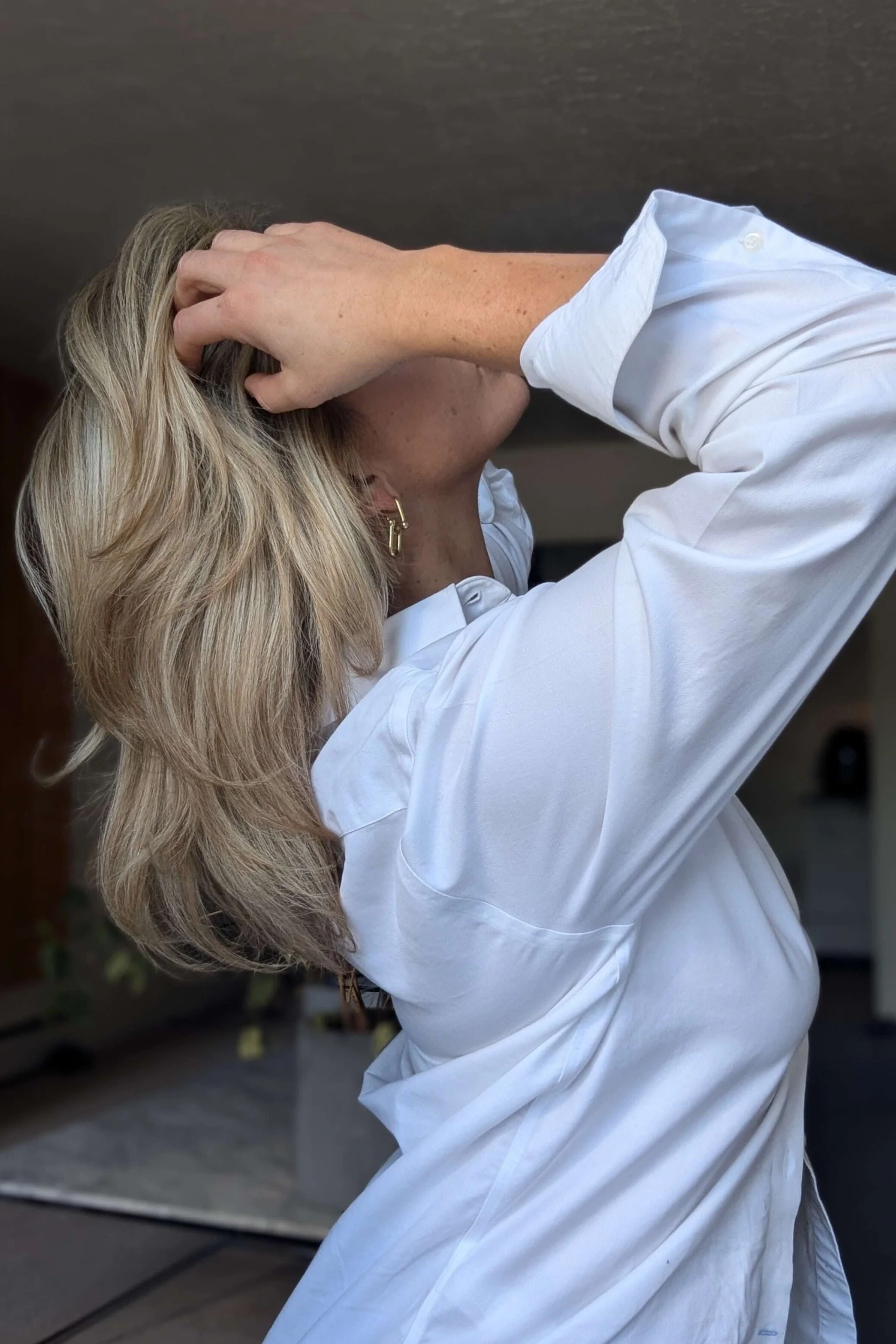 Larissa from Valos Hair Salon Vancouver, featuring expertly styled dimensional blonde balayage