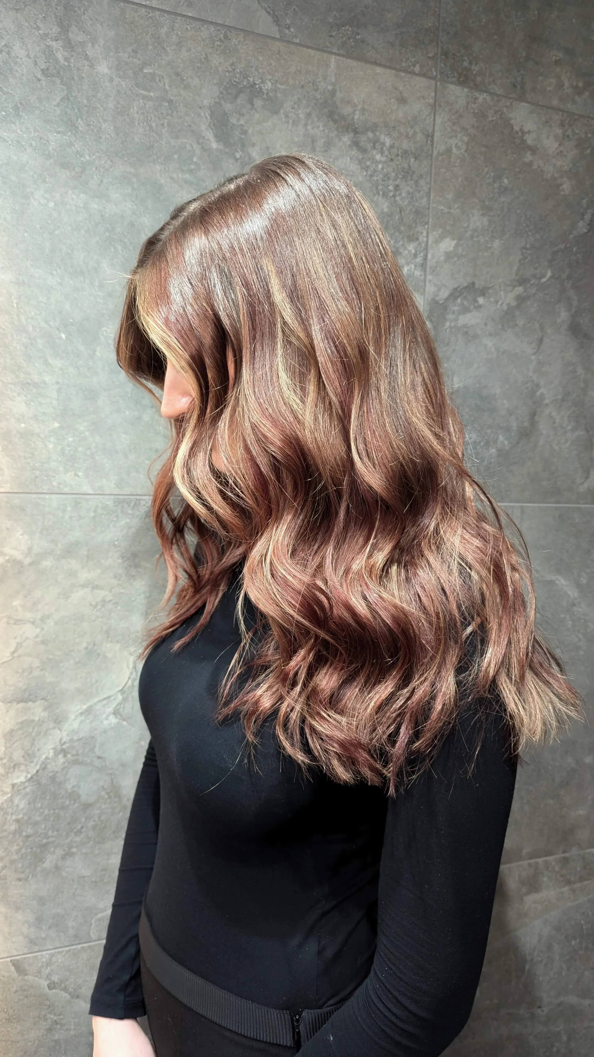 Copper-brunette dimensional balayage, highlighting expert hair coloring at Valos Hair Salon in Vancouver