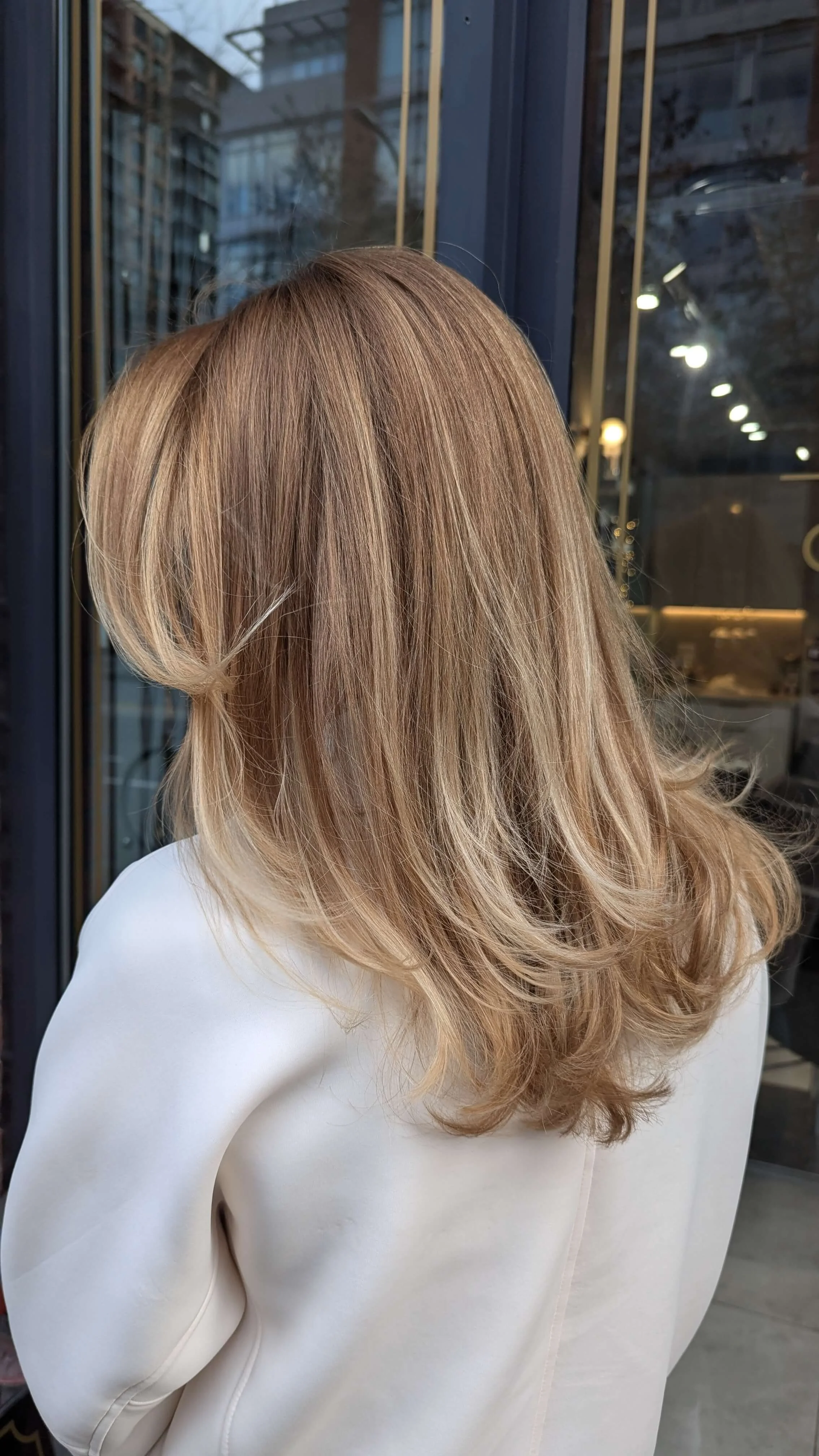 Dimensional balayage by Valos Hair Salon, specializing in luxury hair coloring in downtown Vancouver
