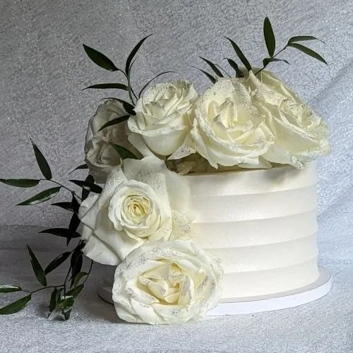 Single-tier floral wedding bakery cake with buttercream flowers, handcrafted in Fort Washington and serving the DMV area