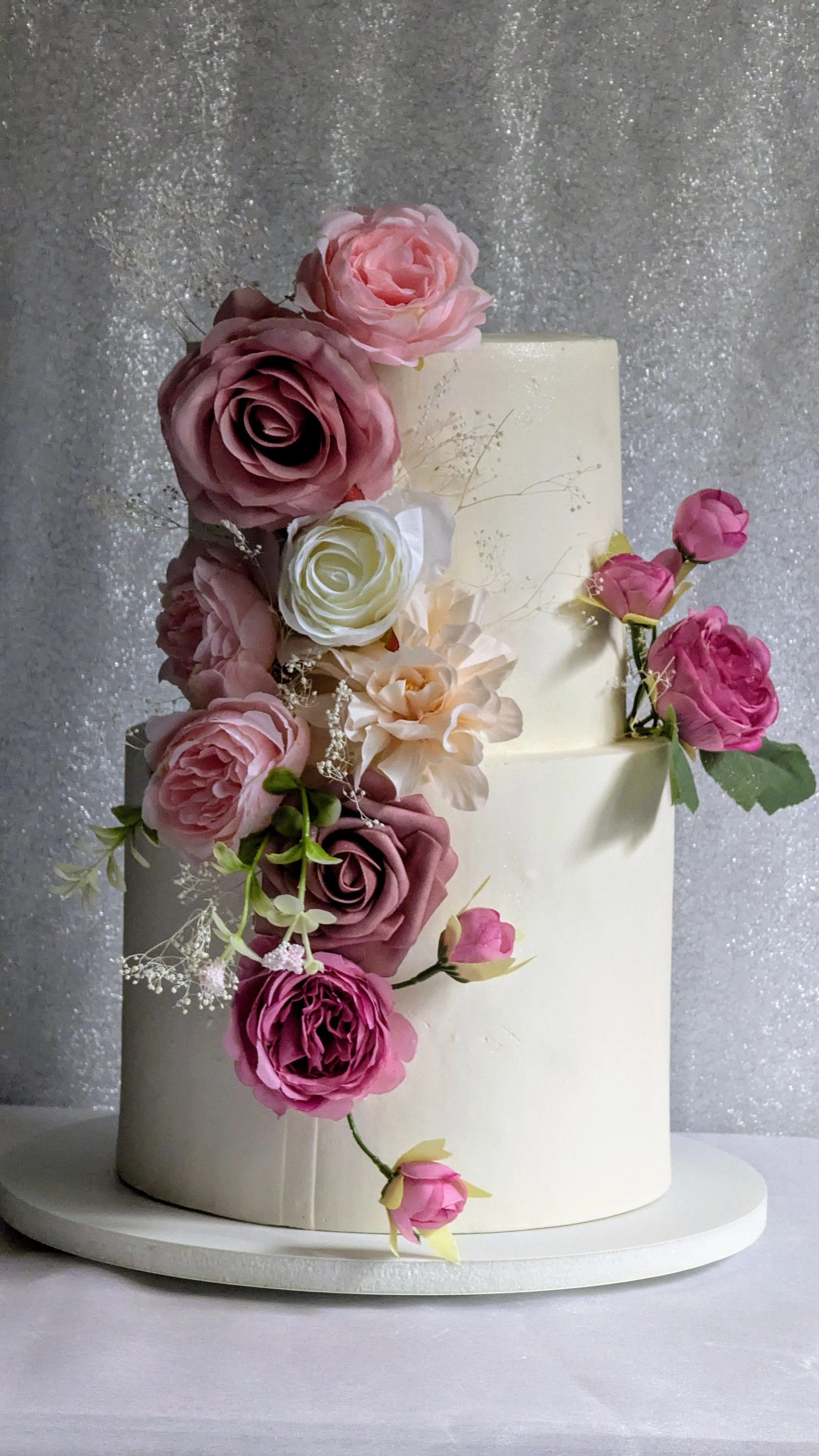 Freshly decorated celebration cake featuring detailed buttercream flowers for a special event in Prince George's County.