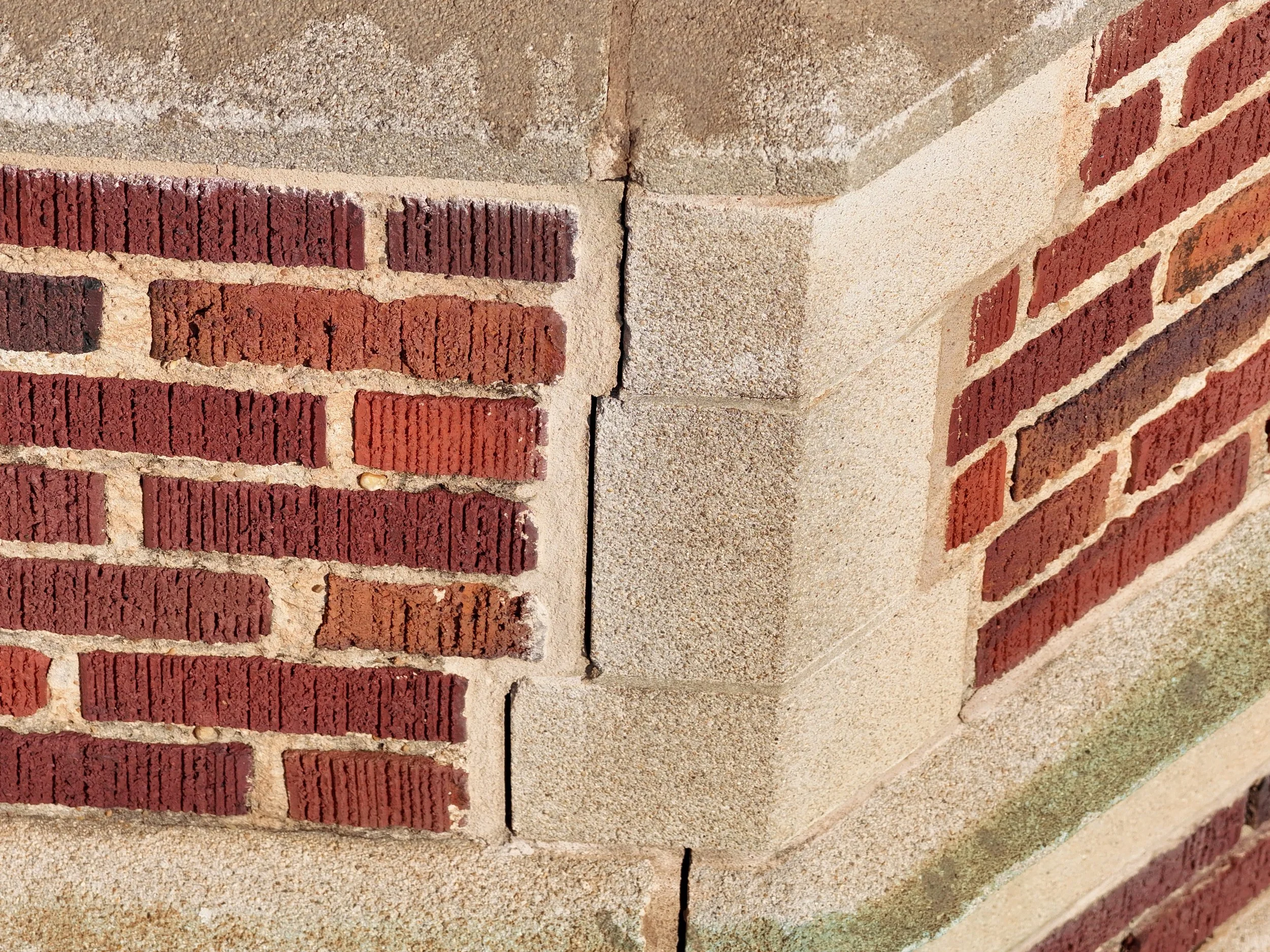 Aerial structural inspection showing facade damage