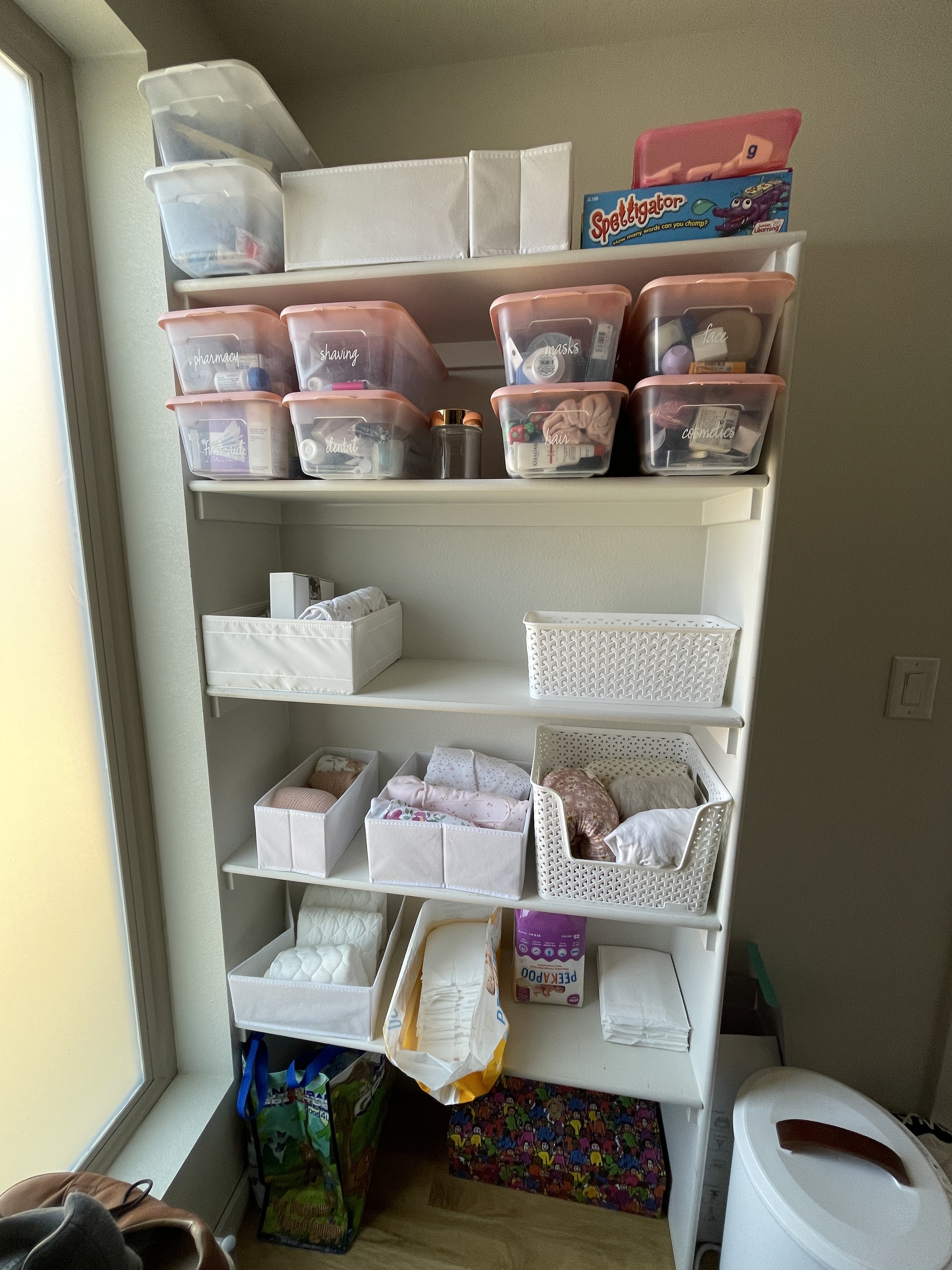 After image of professionally organized nursery station with grouped, labeled, and organized categories and sections.