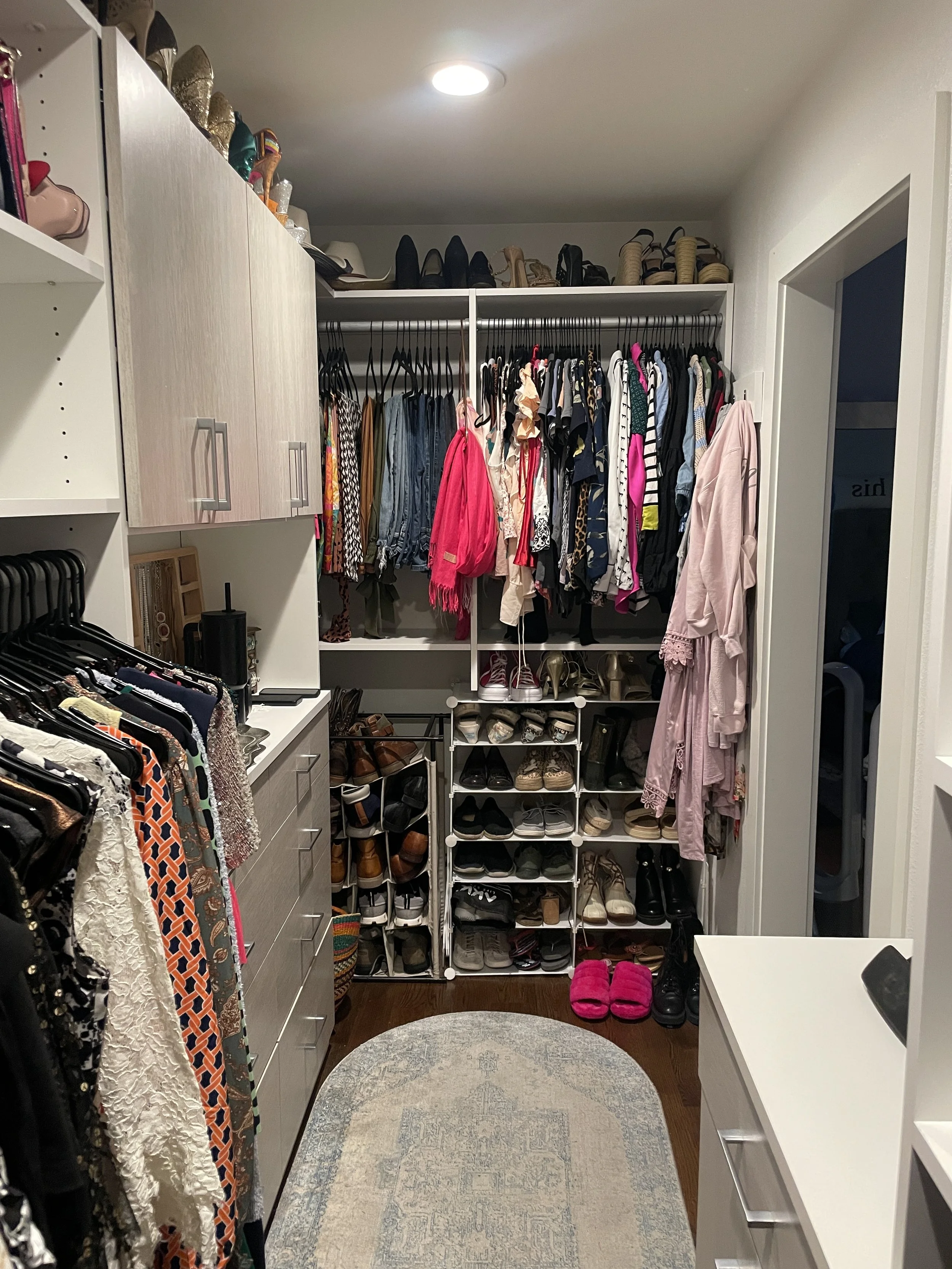 After image of an organized and categorized walk-in closet with shoe racks rebuilt, hanging space utilized, high heels displayed, and clothes able to be found in Denver, CO.
