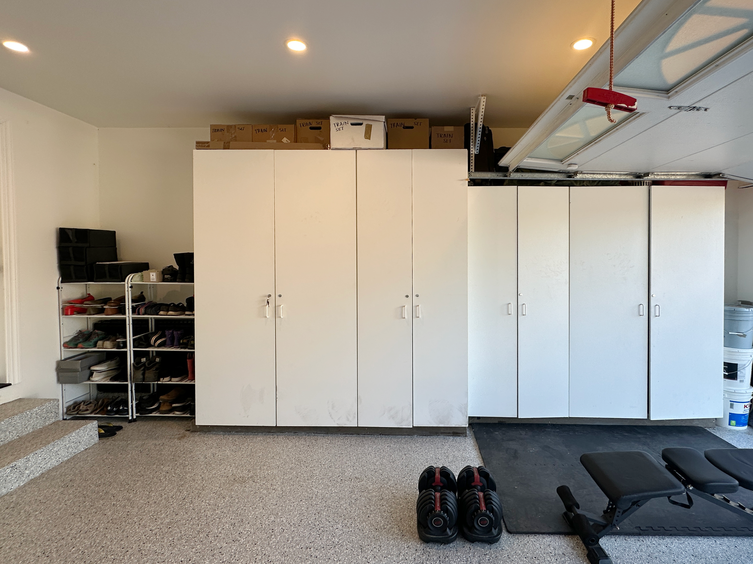 After image of a garage with shoe shelves organized and displayed, and organized cabinets in Los Altos, CA