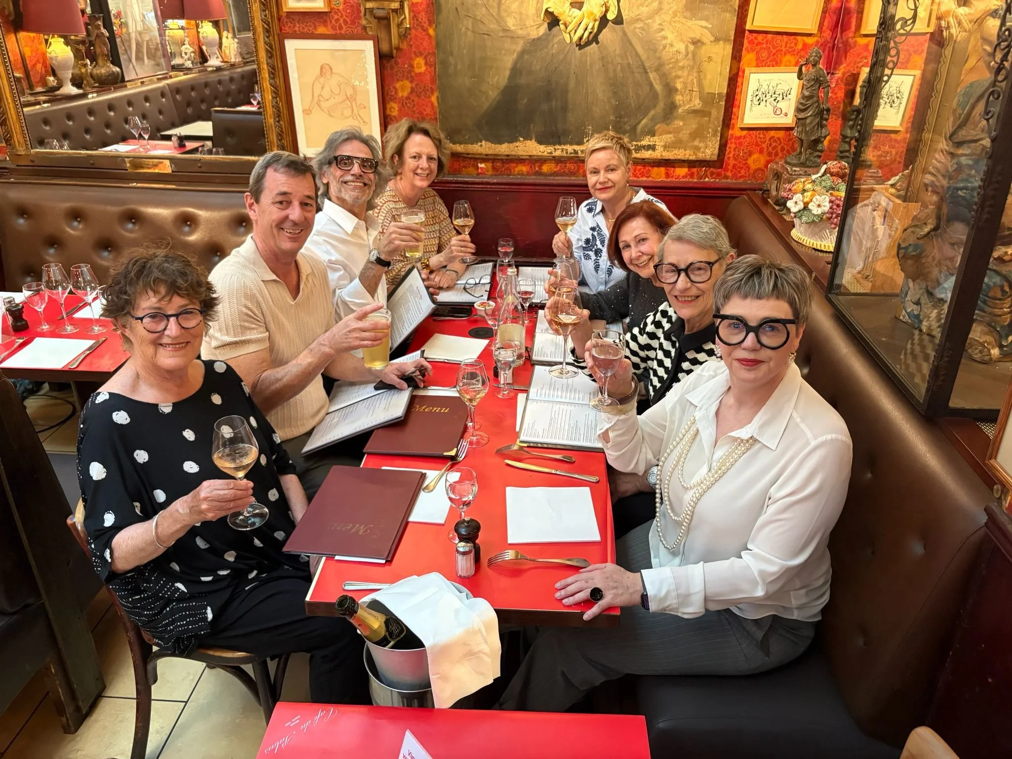 Avenue French students enjoying a group dinner during a French language and cultural immersion experience in France.