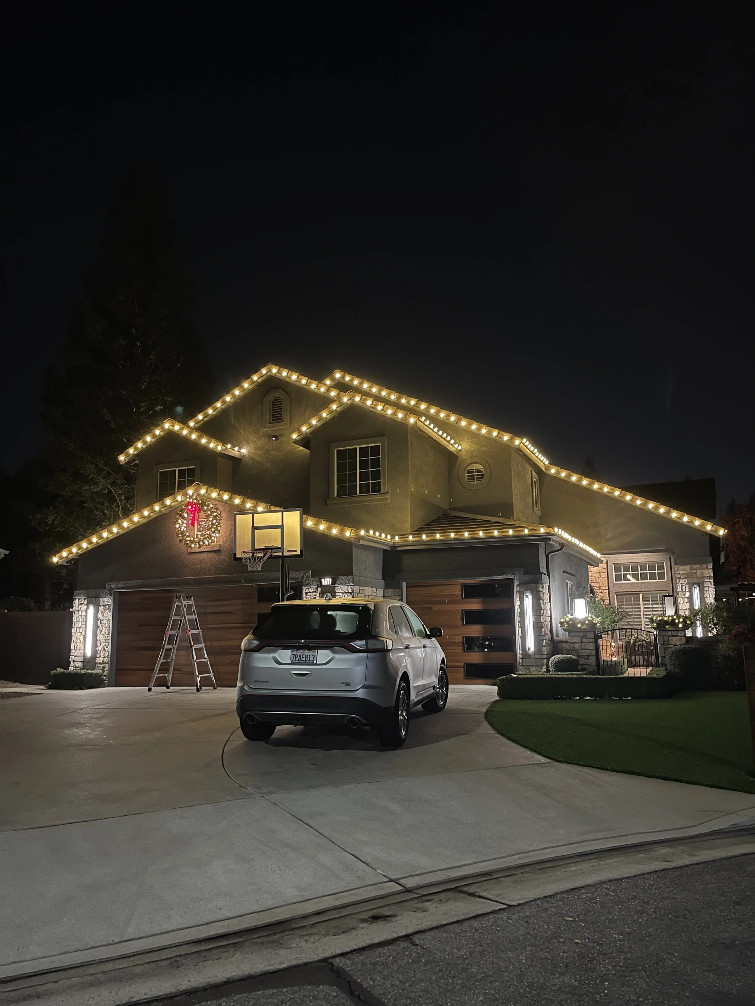 Professional Christmas light installation in Clovis with a custom installed light up wreath