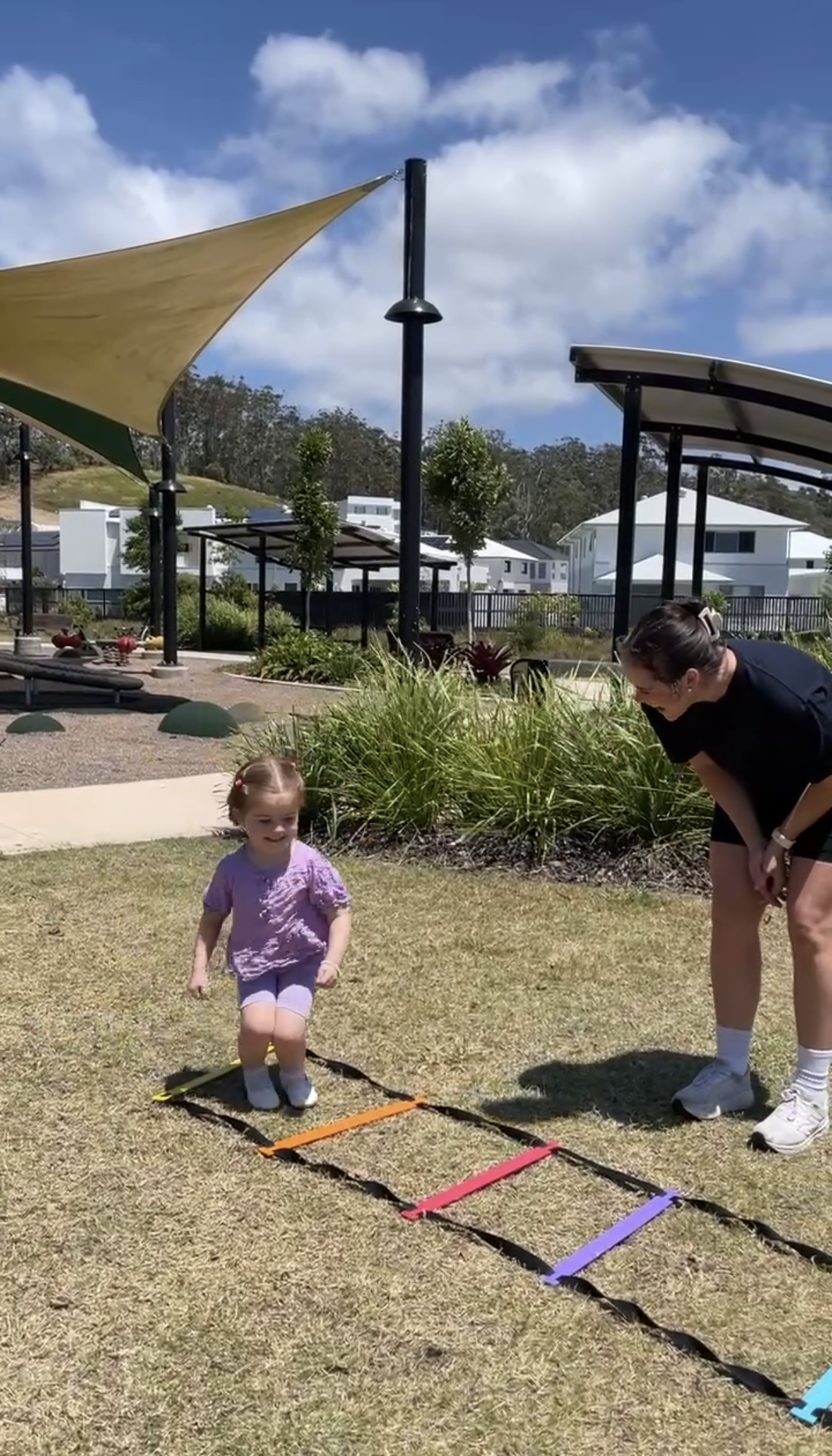 Ali Physio doing a session with a young girl at a playground